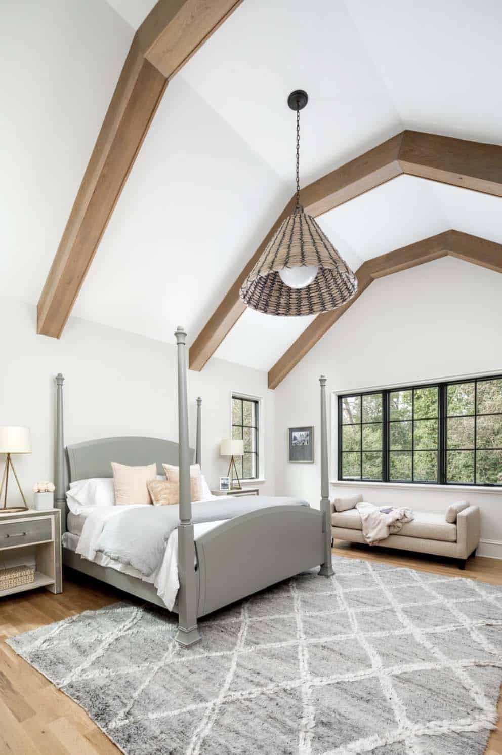 transitional-bedroom-with-a-vaulted-wood-beam-ceiling