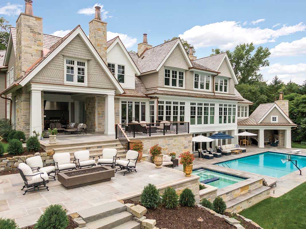 coastal-style-lake-house-exterior-with-a-pool