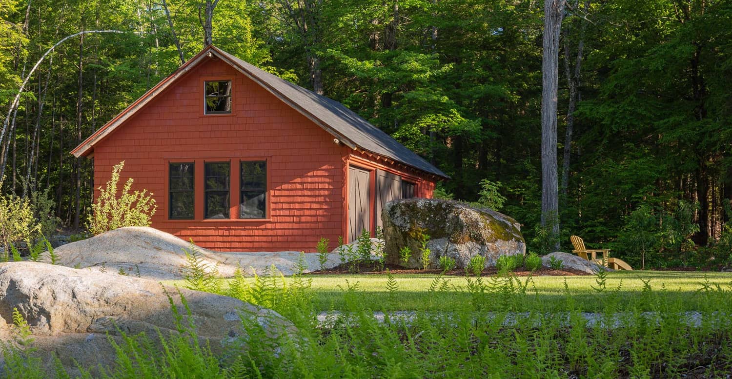  adirondack-style-house-with-a-red-barn