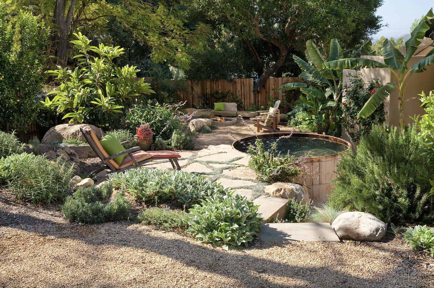naturalist-hot-tub-with-flagstone-and-a-fire-pit-backyard-landscaping