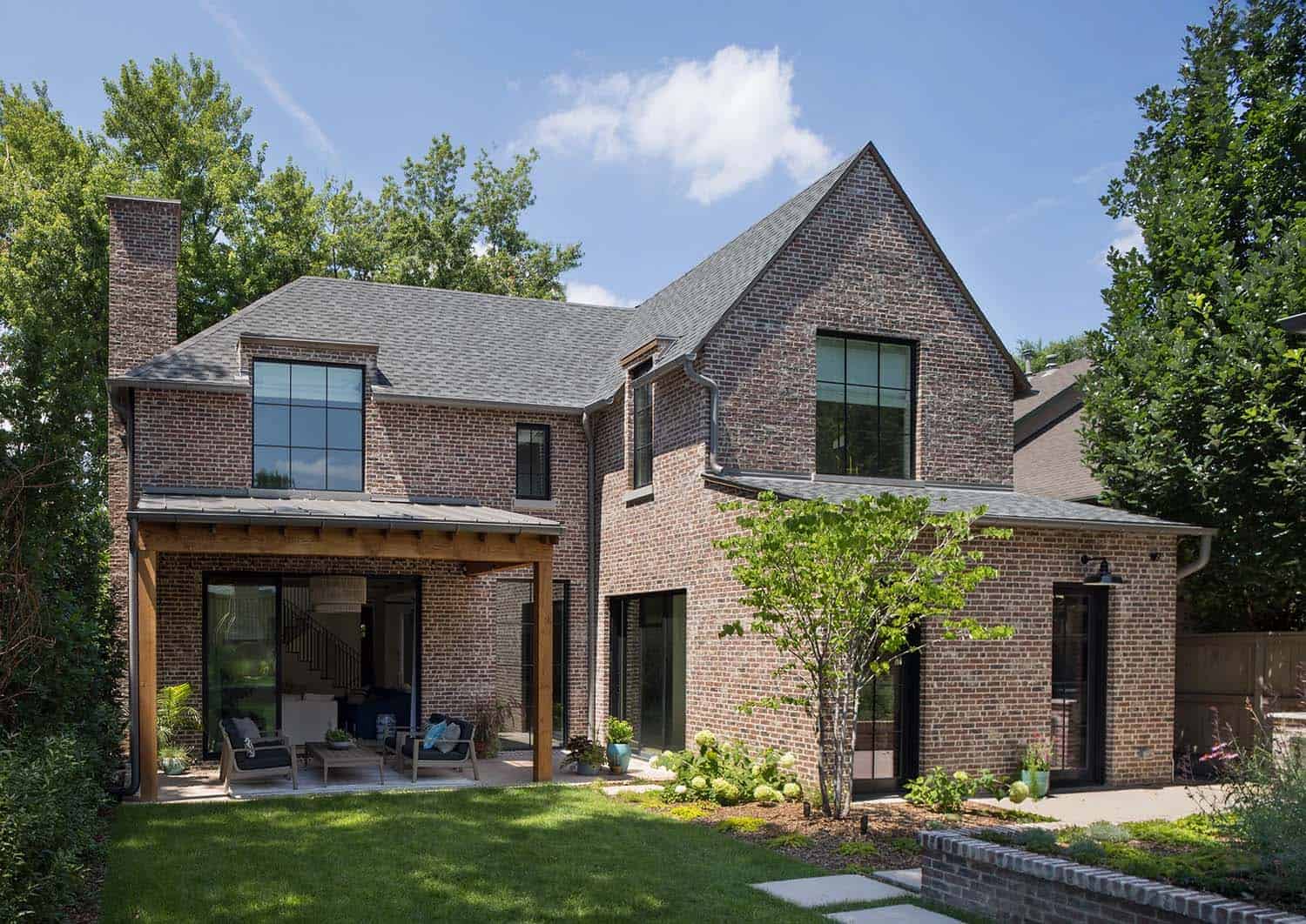 brick-home-two-story-exterior-backyard