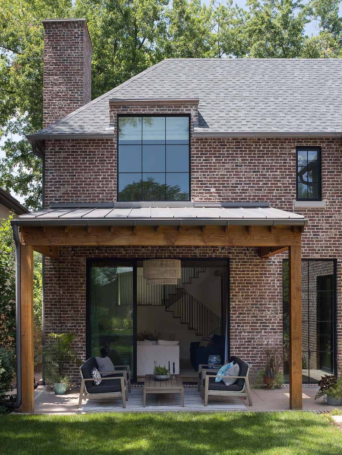 brick-home-two-story-exterior-backyard-with-a-covered-porch