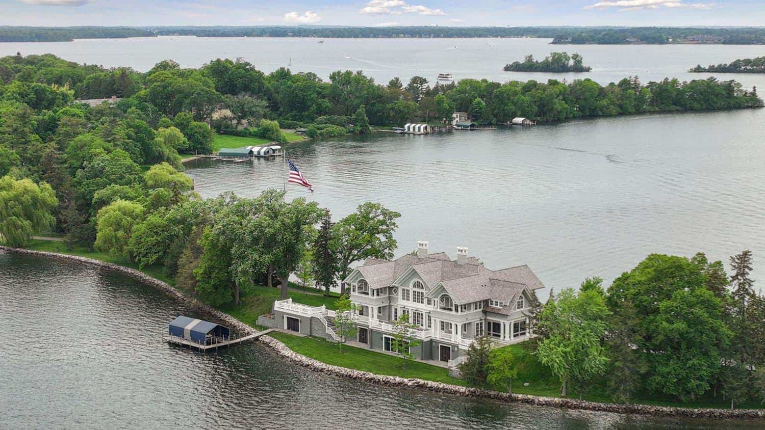 east-coast-shingle-style-lake-house-exterior-aerial-view