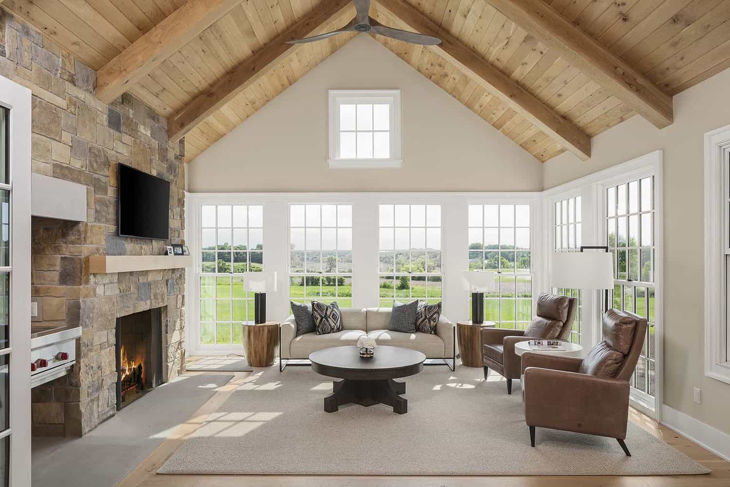 modern-farmhouse-sunroom-with-a-fireplace