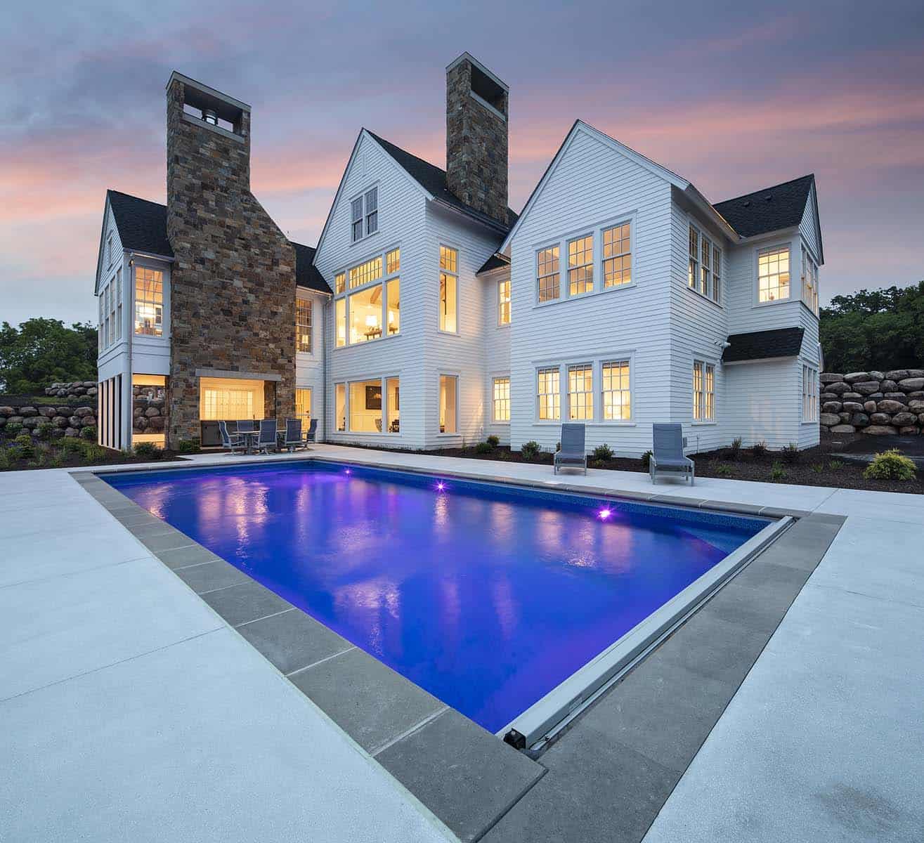 modern-farmhouse-swimming-pool-at-dusk