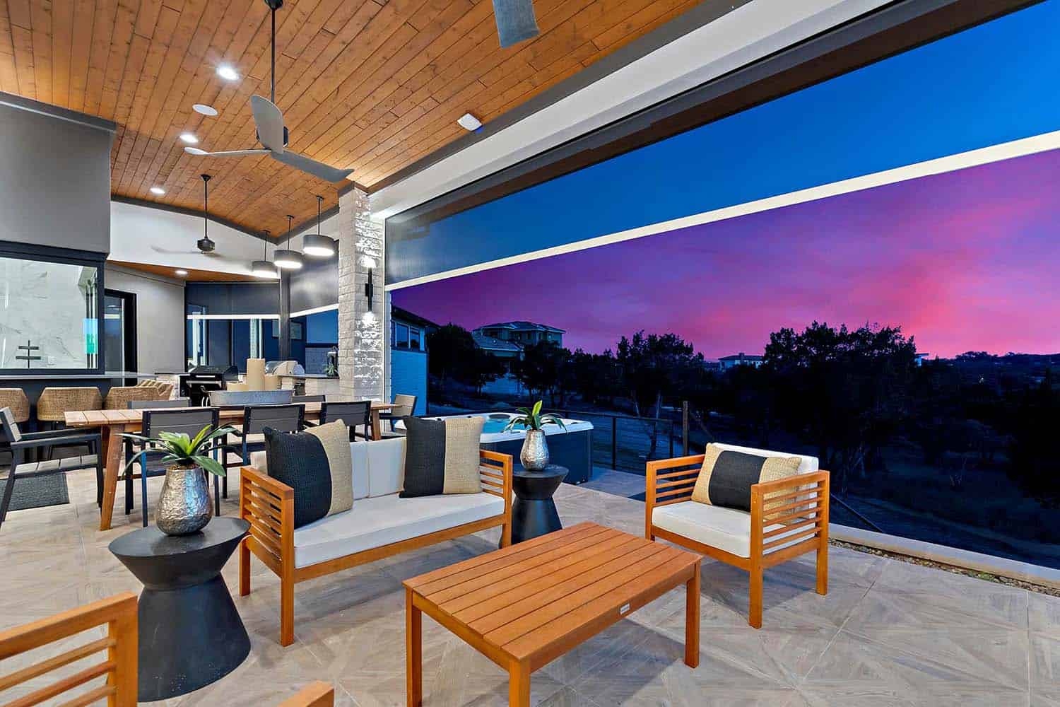 modern-lake-house-covered-patio-at-dusk