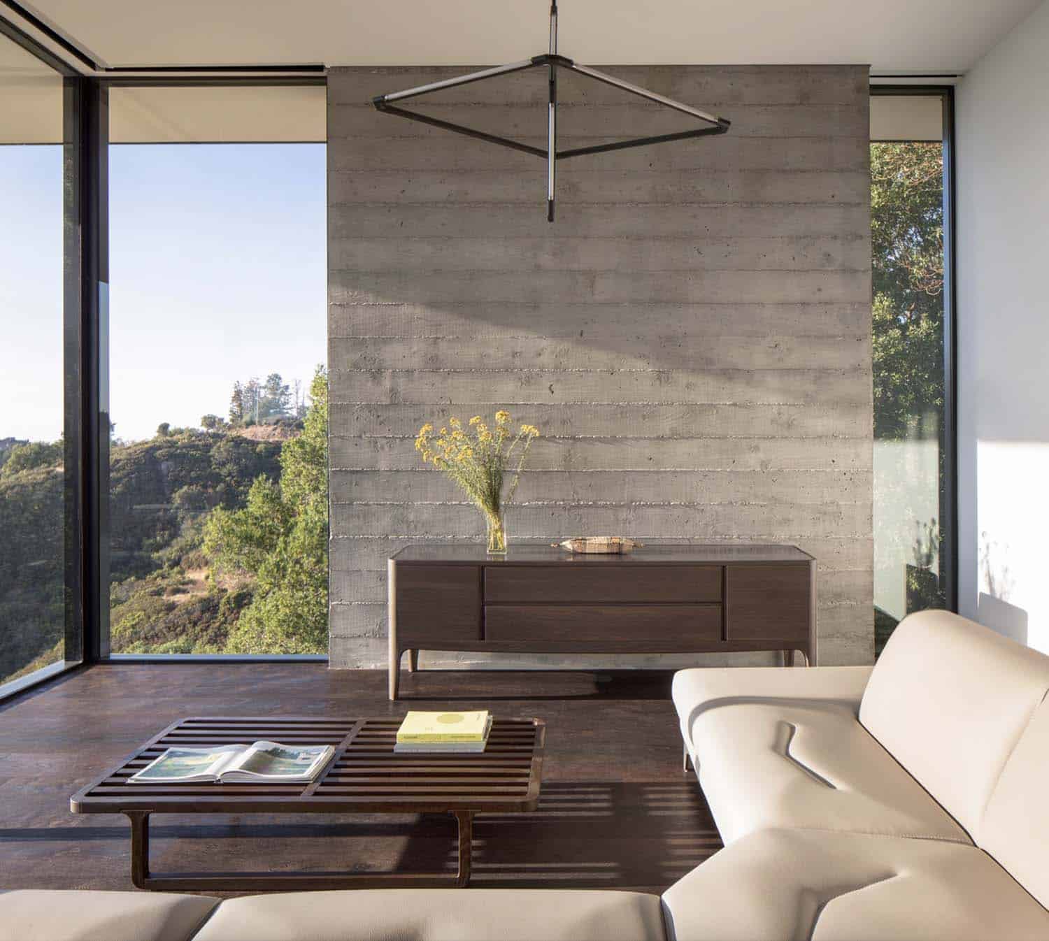 modern-living-room-with-a-board-formed-concrete-wall 