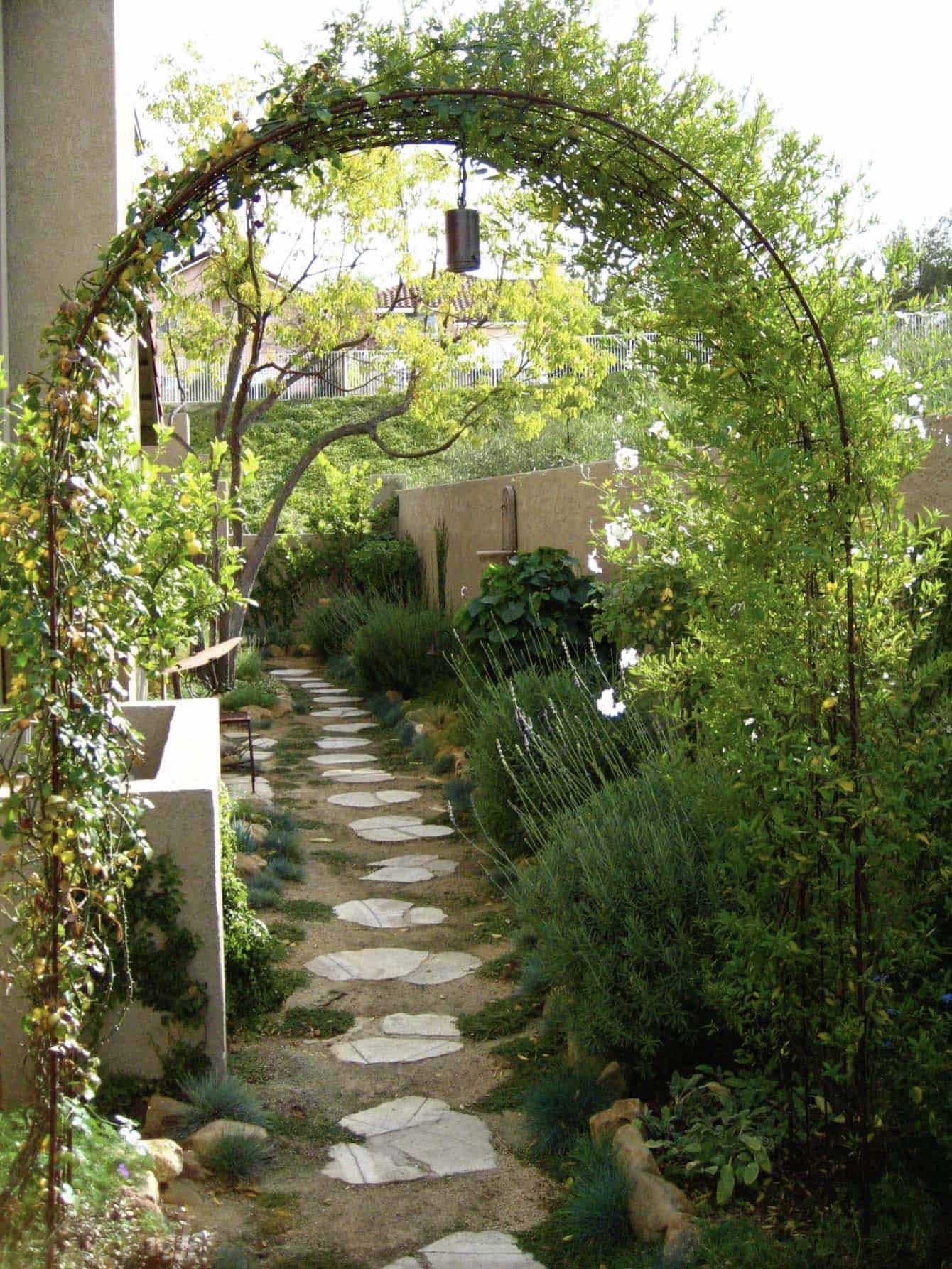 trellis-arch-pathway-into-a-secret-side-garden