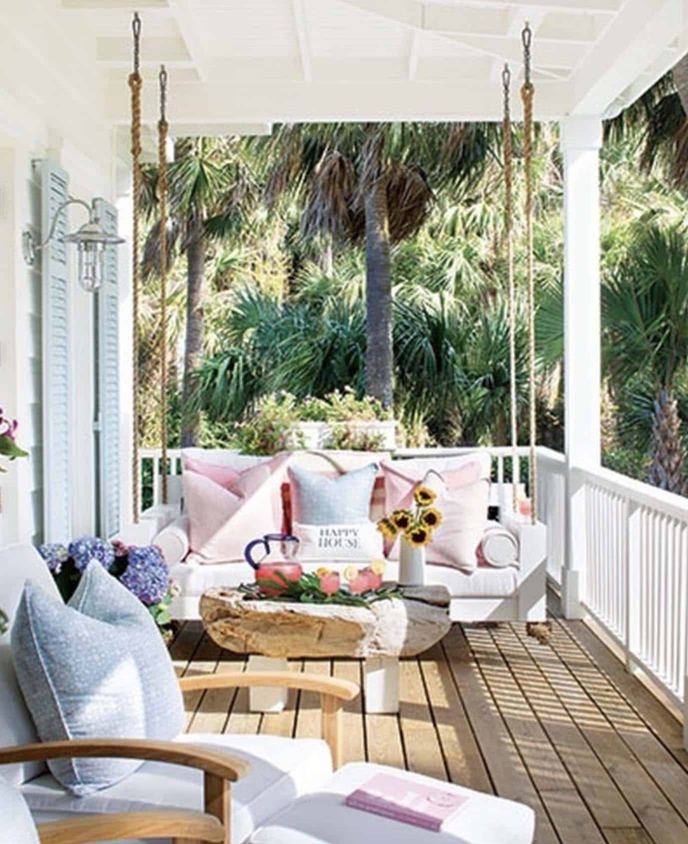 front porch with a hanging swing