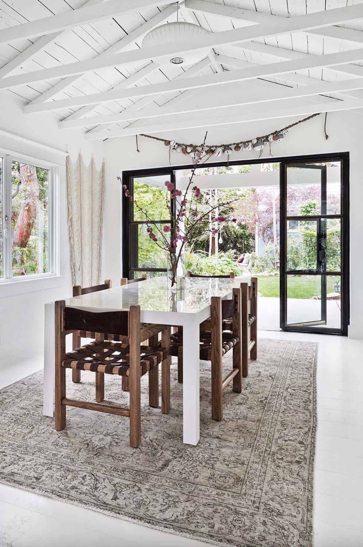 beach-style-dining-room-with-french-doors