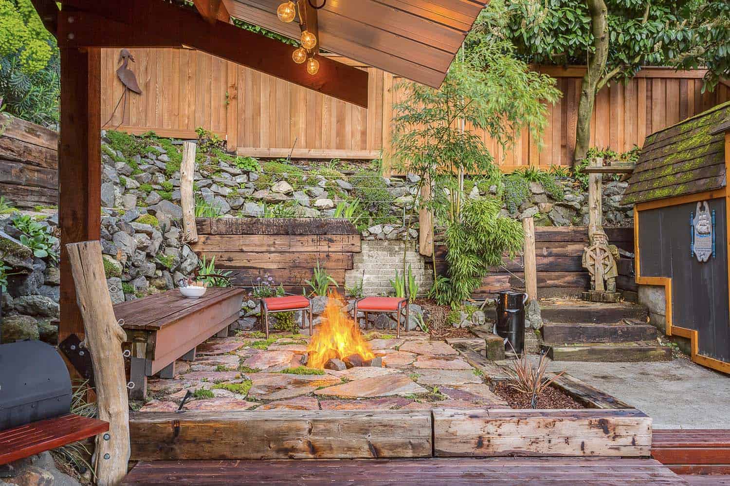 small-backyard-patio-with-a-vertical-garden-and-fire-pit