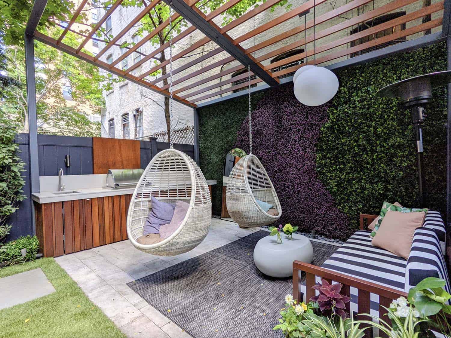 backyard-kitchenette-and-pergola-with-hanging-chairs