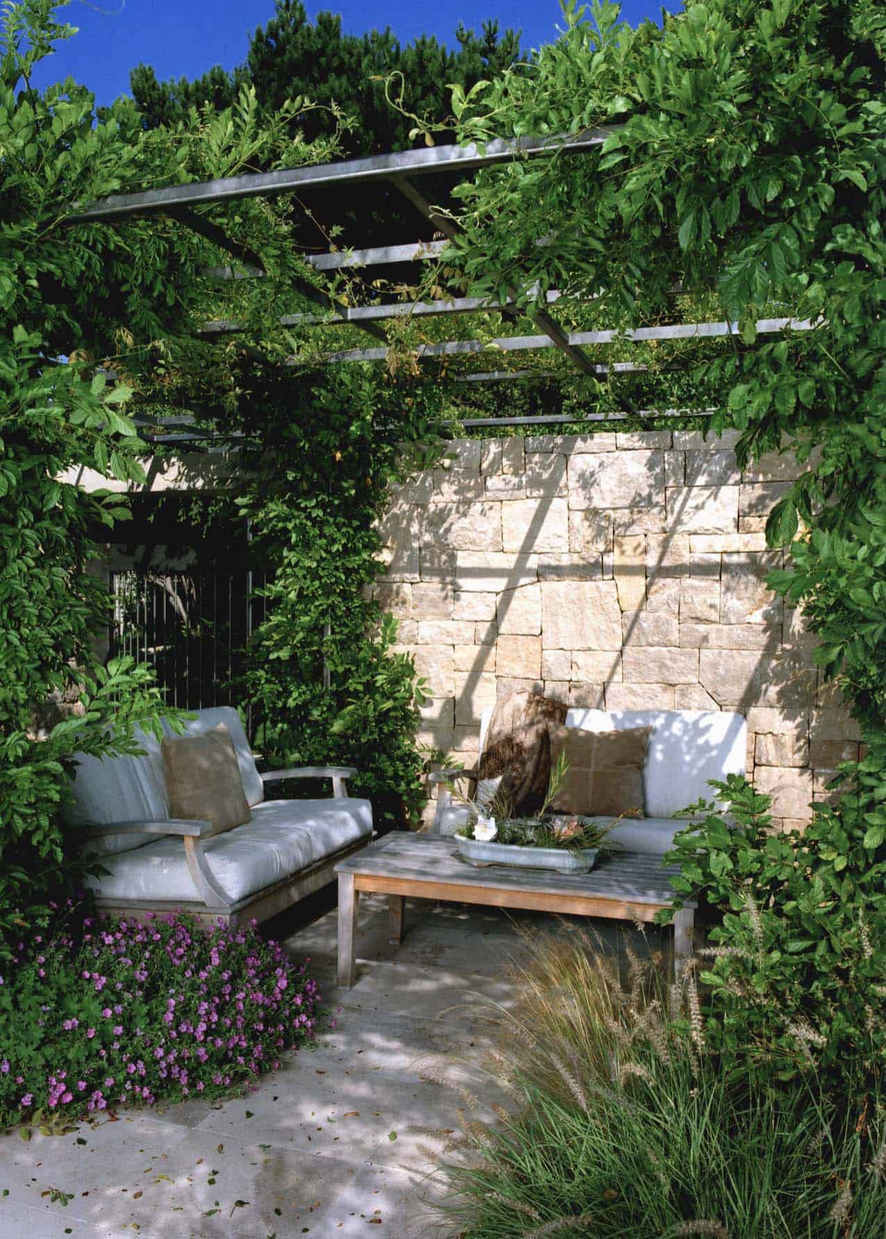 secret-garden-nook-with-a-trellis-and-outdoor-furniture