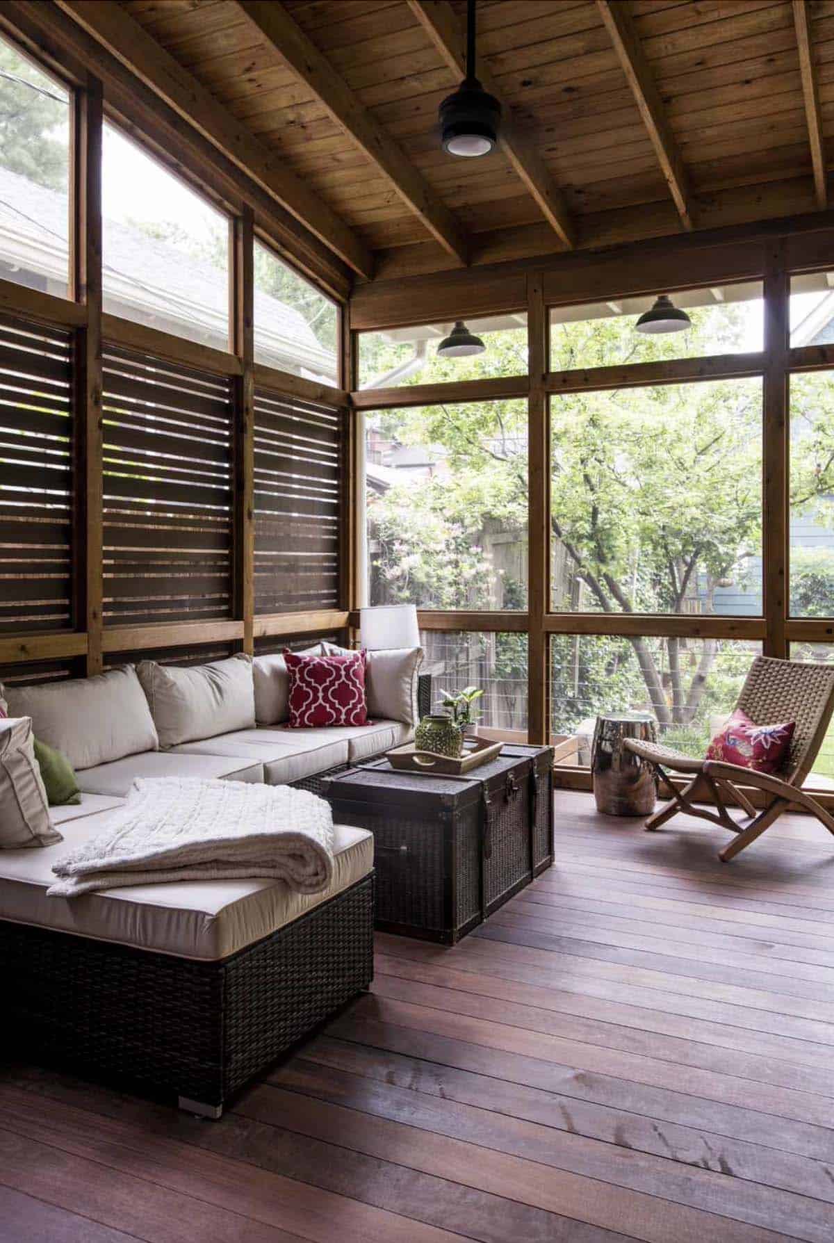 rustic screened porch with a wood privacy screen