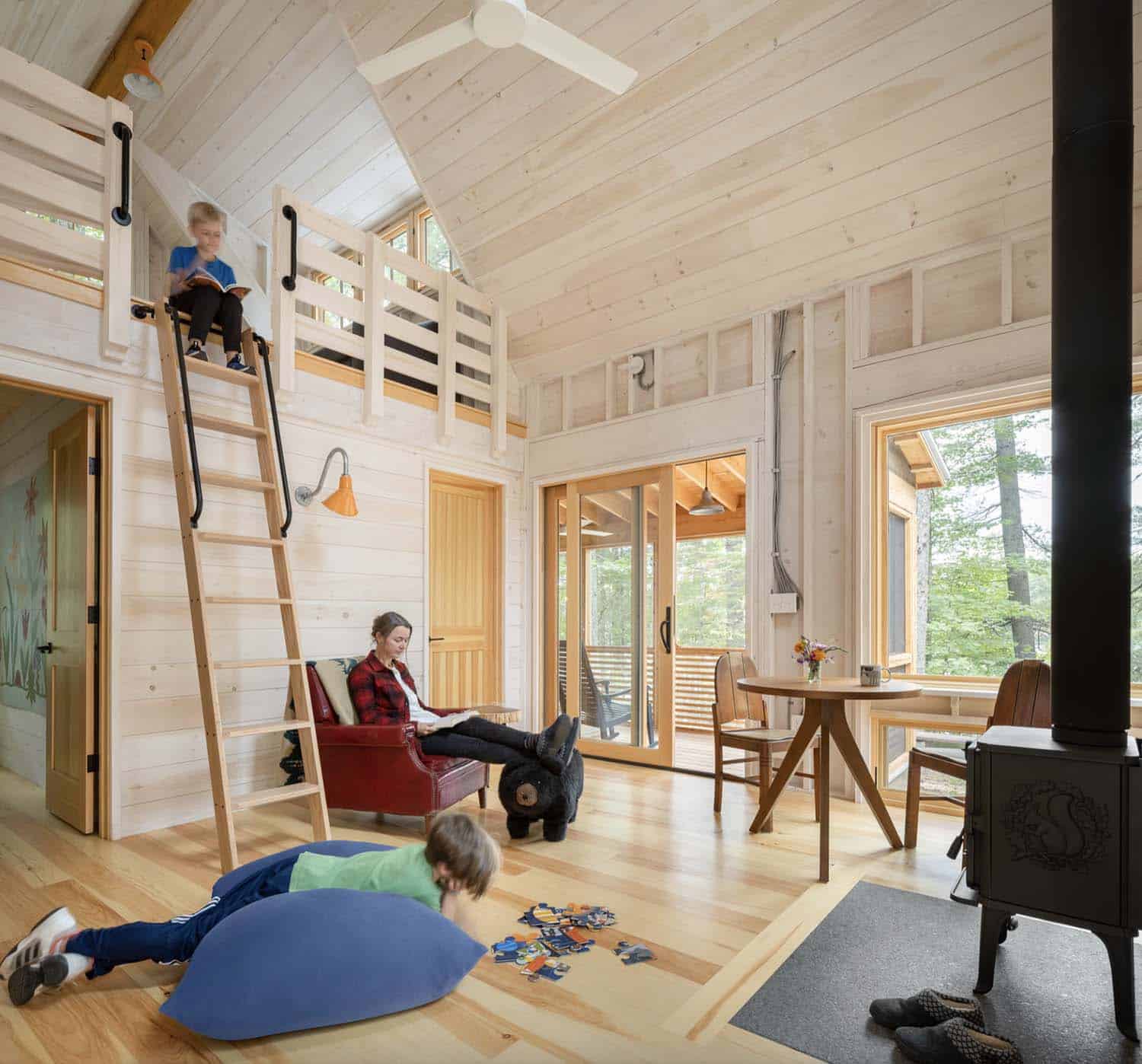 modern rustic cabin family room with a loft