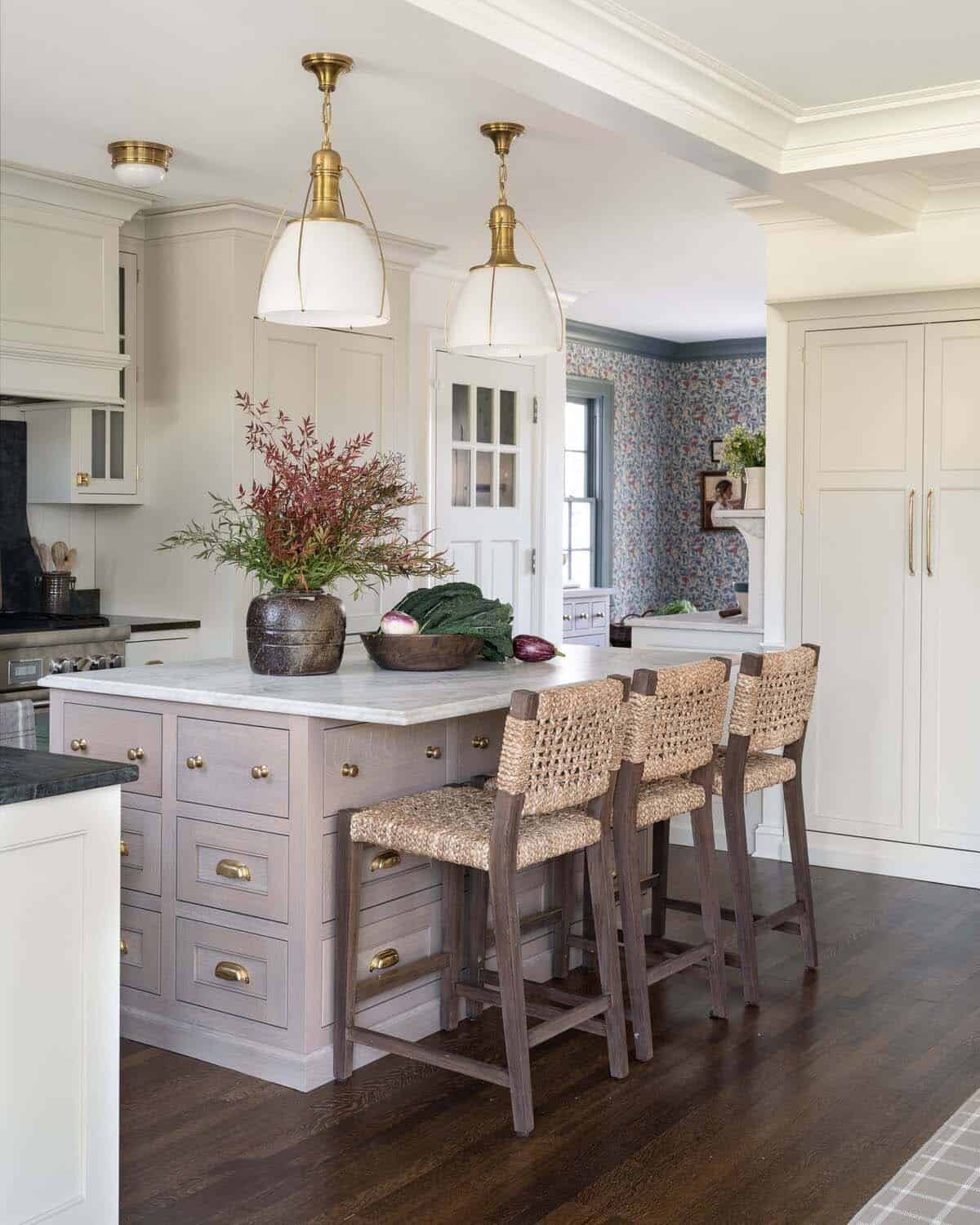 transitional kitchen with an island and bar stools