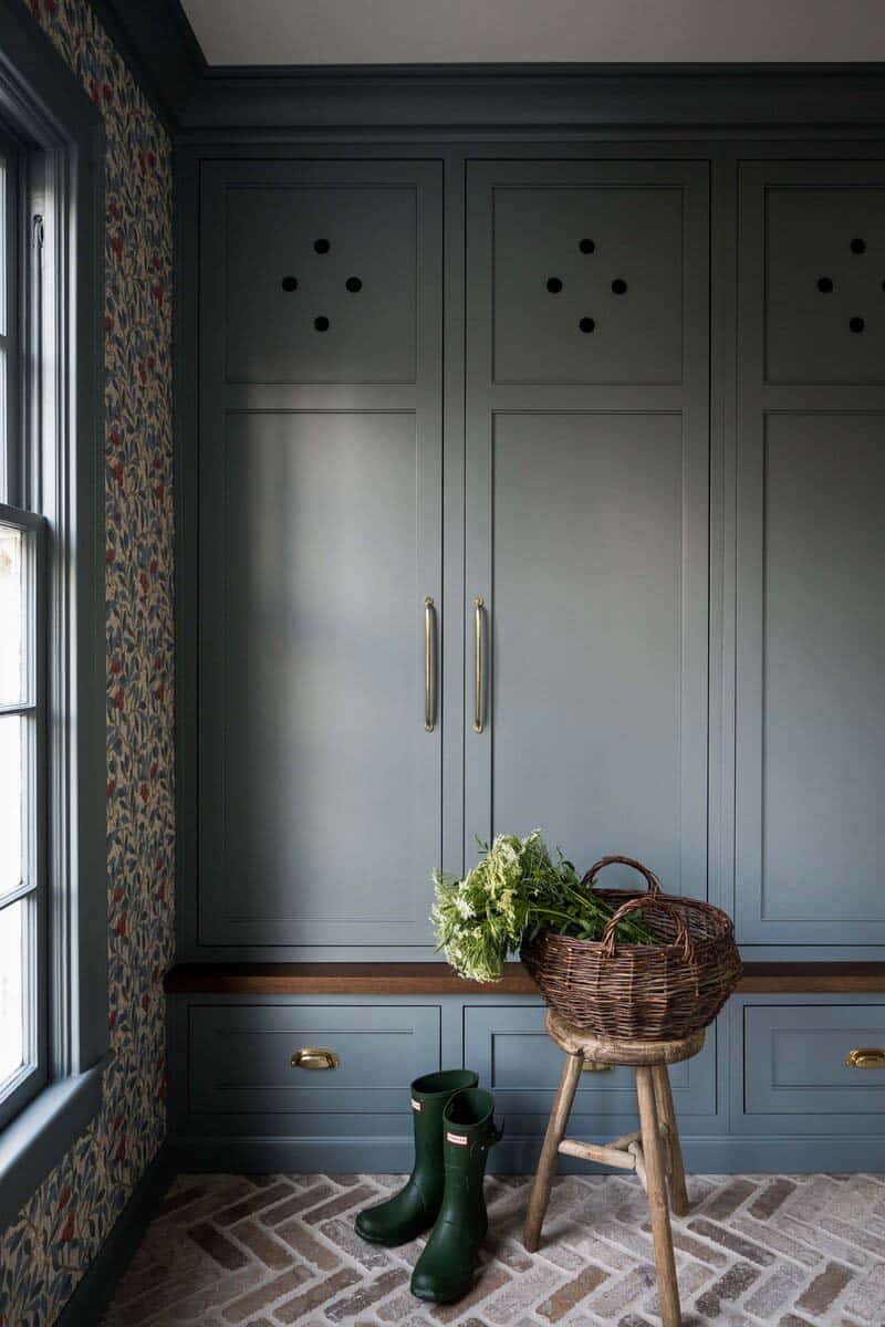 transitional mudroom with storage cabinets