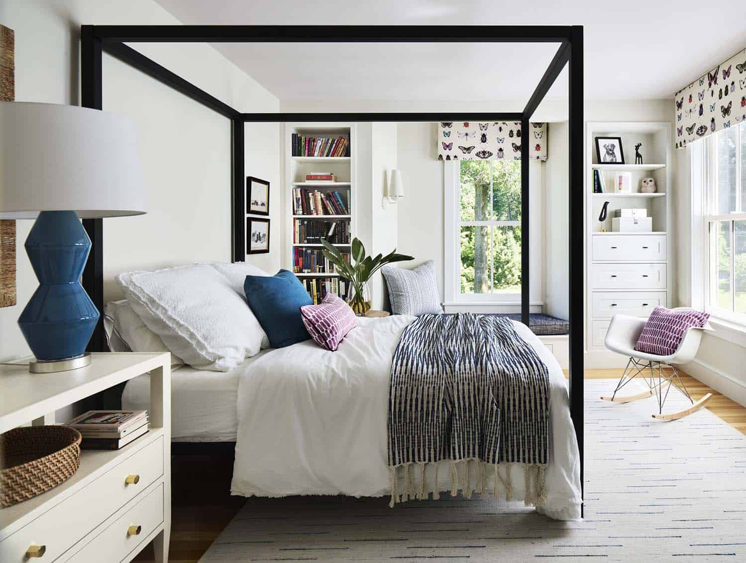 contemporary bedroom with a canopy bed