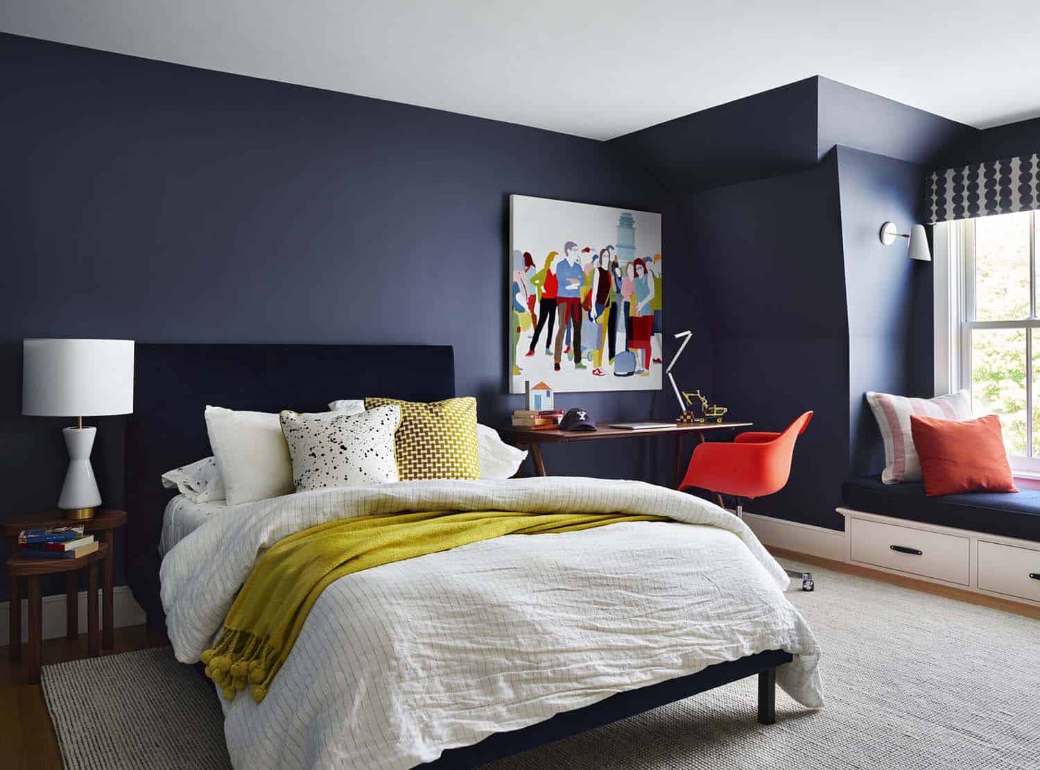 contemporary bedroom with dark blue walls