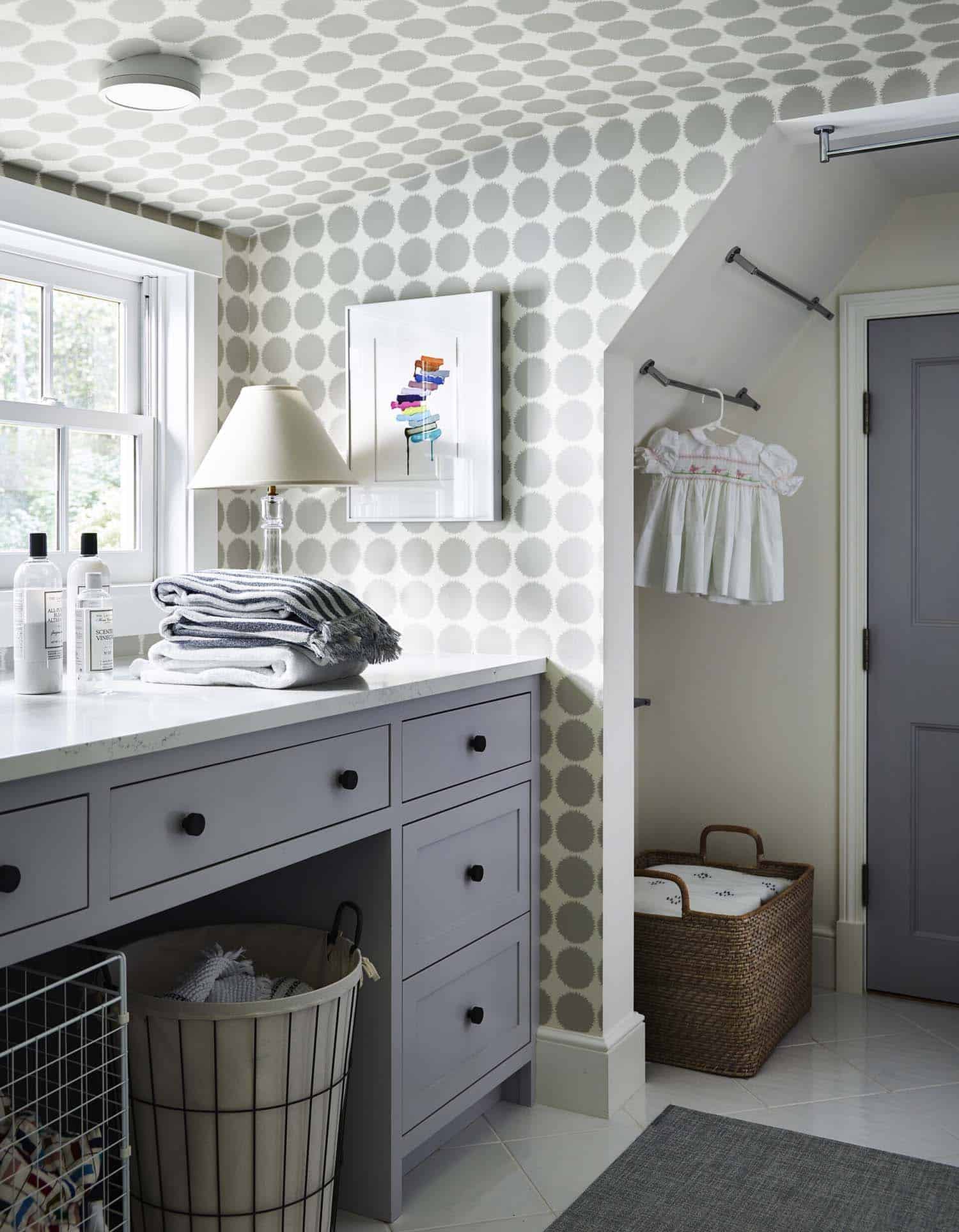 contemporary laundry room with an angled ceiling