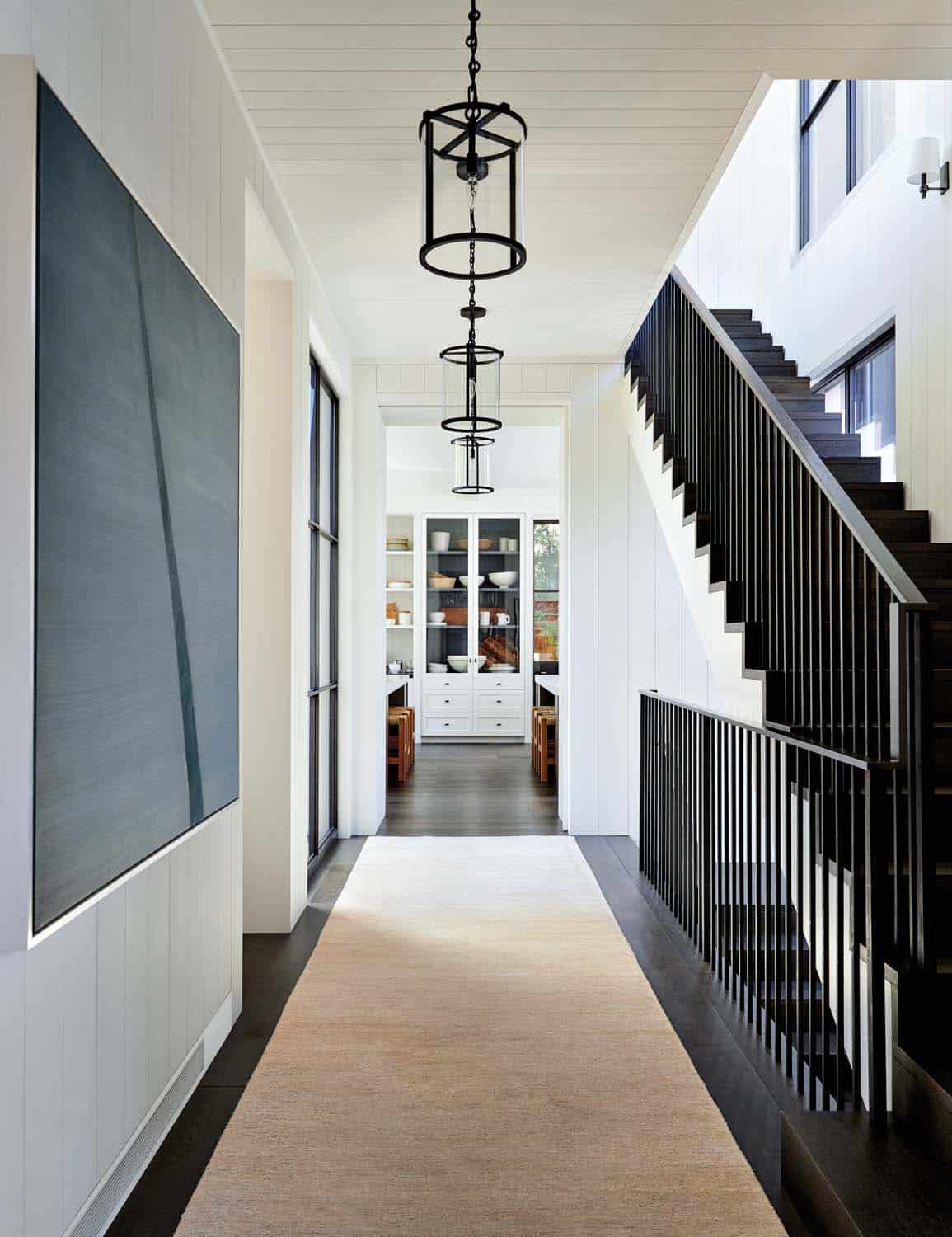 cool contemporary hallway with a staircase