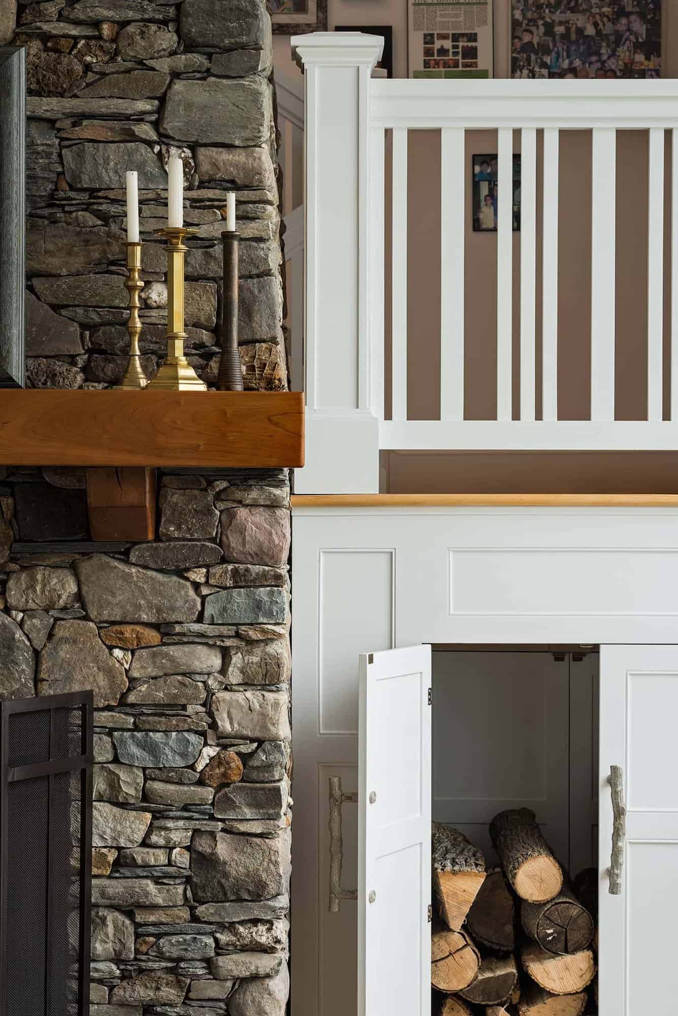 traditional living room fireplace detail with wood storage