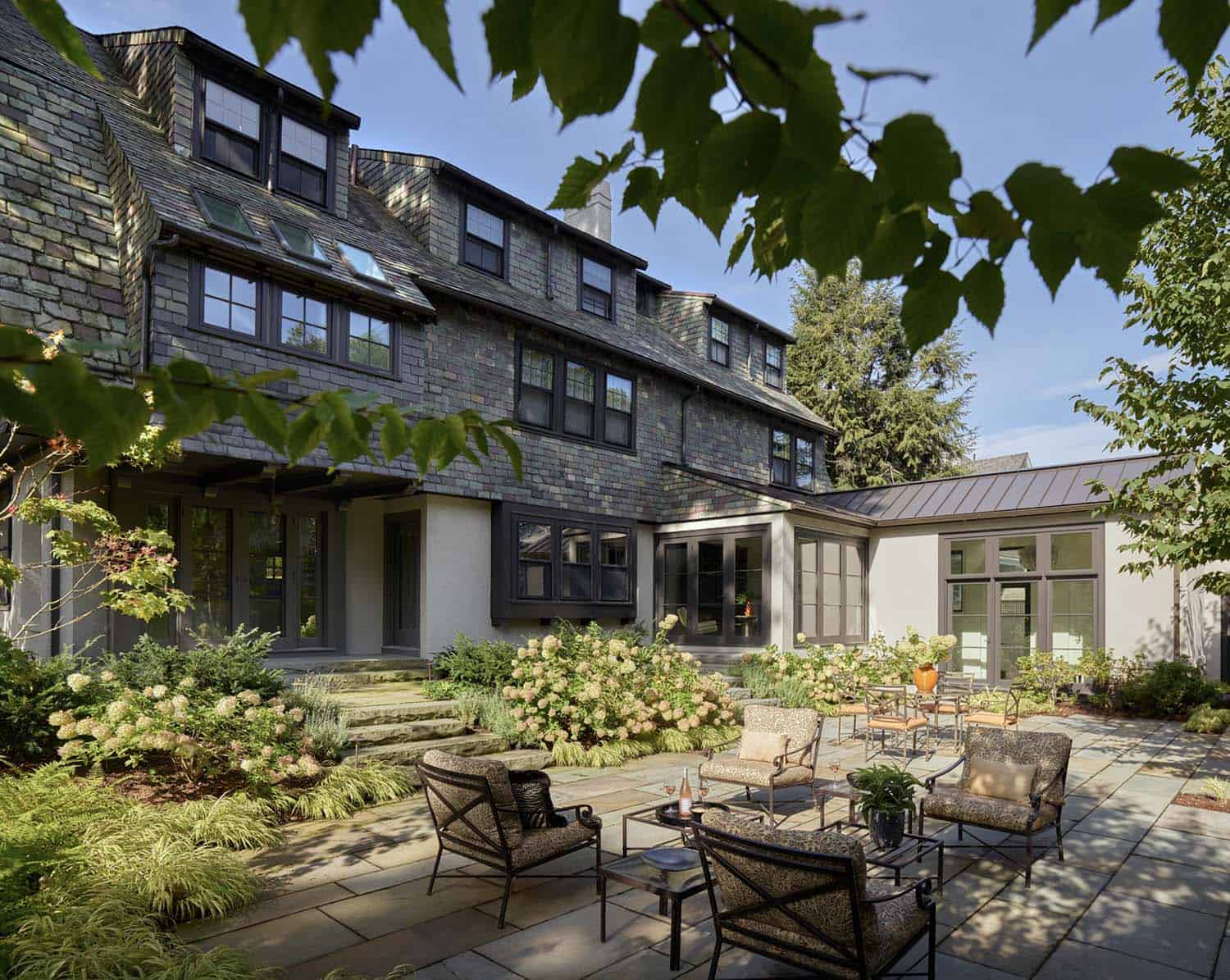 gambrel-style-home-exterior-backyard-patio