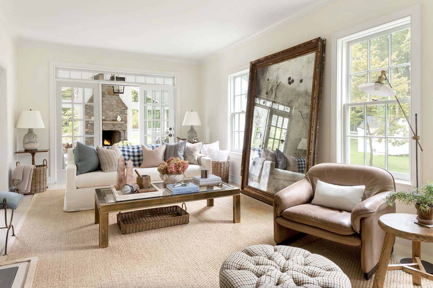 modern farmhouse living room with a large floor mirror