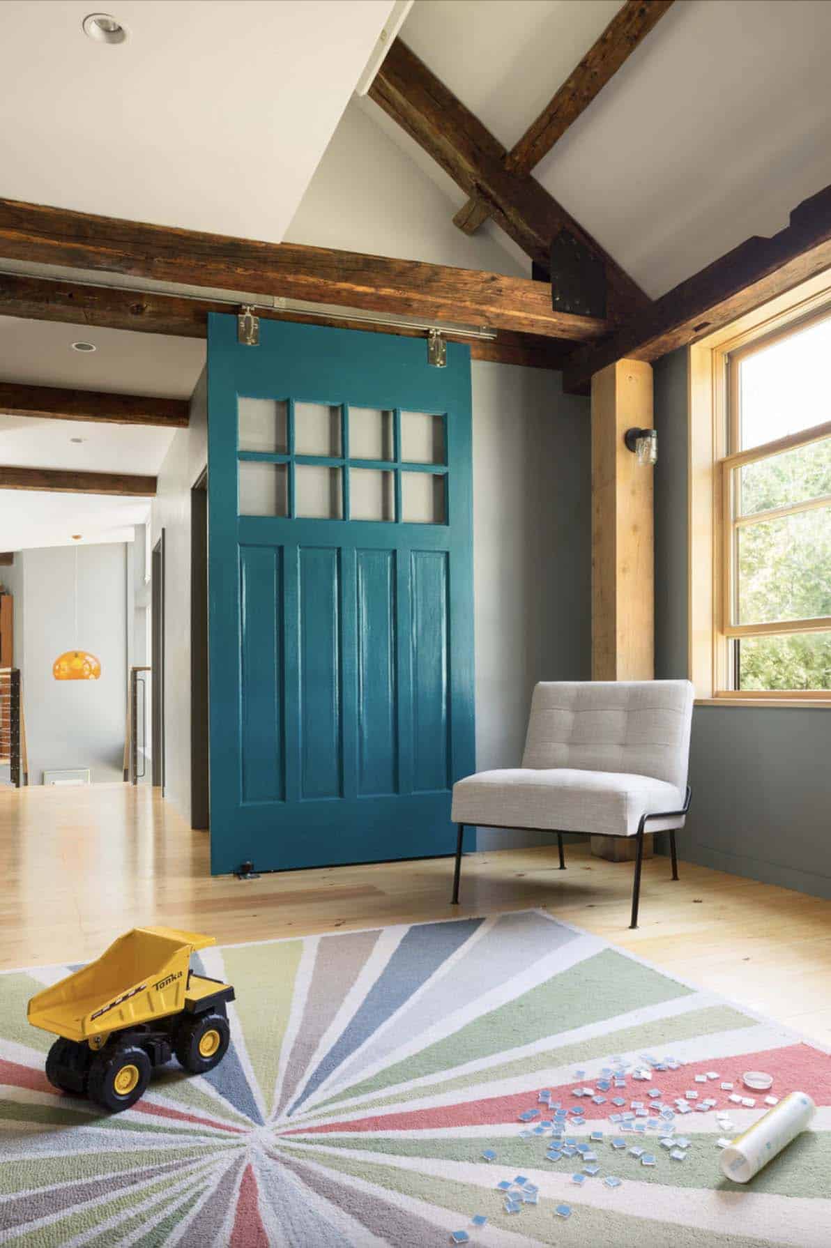 farmhouse family room with a blue sliding door
