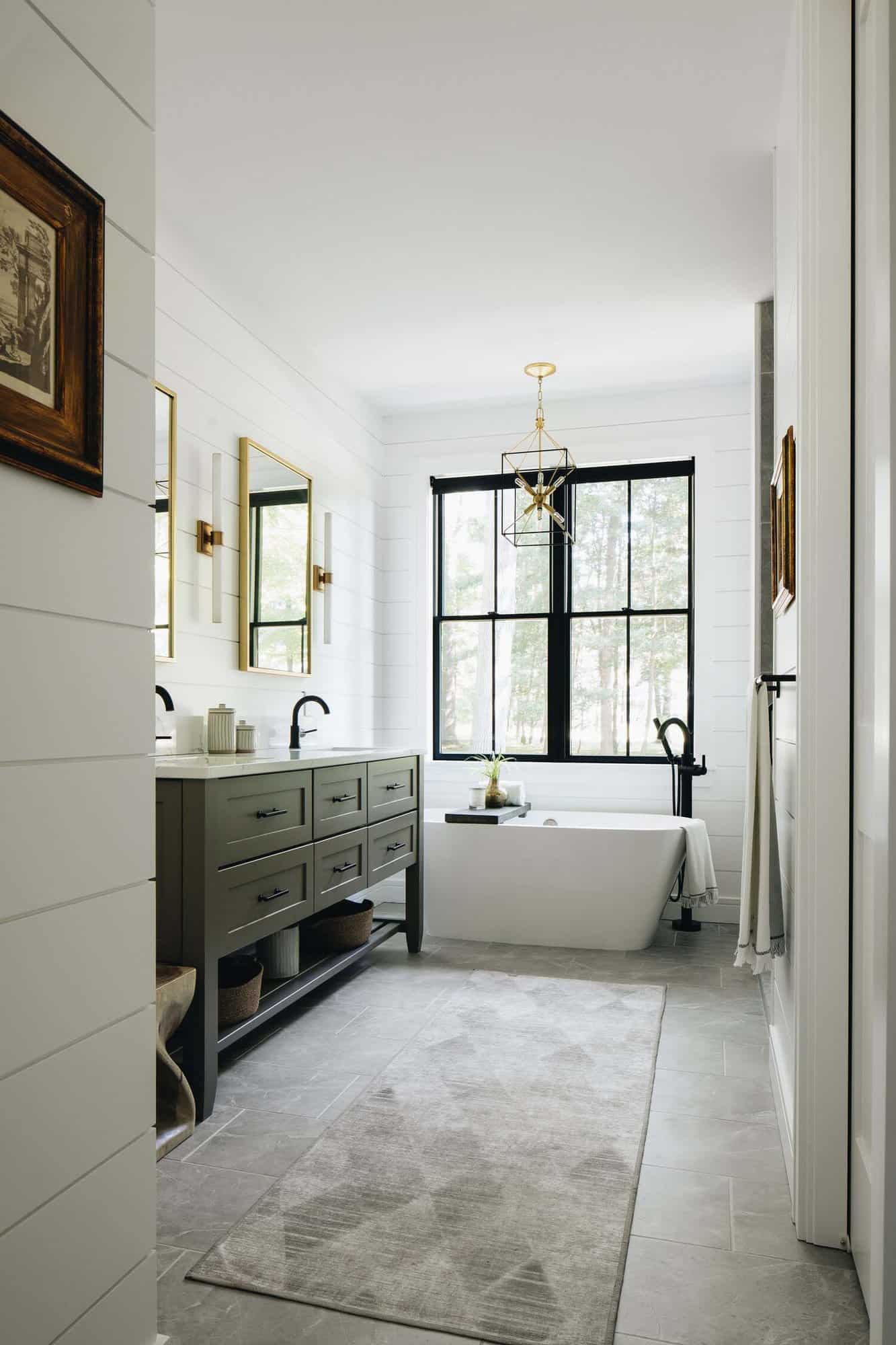 modern farmhouse bathroom with a vanity and freestanding tub