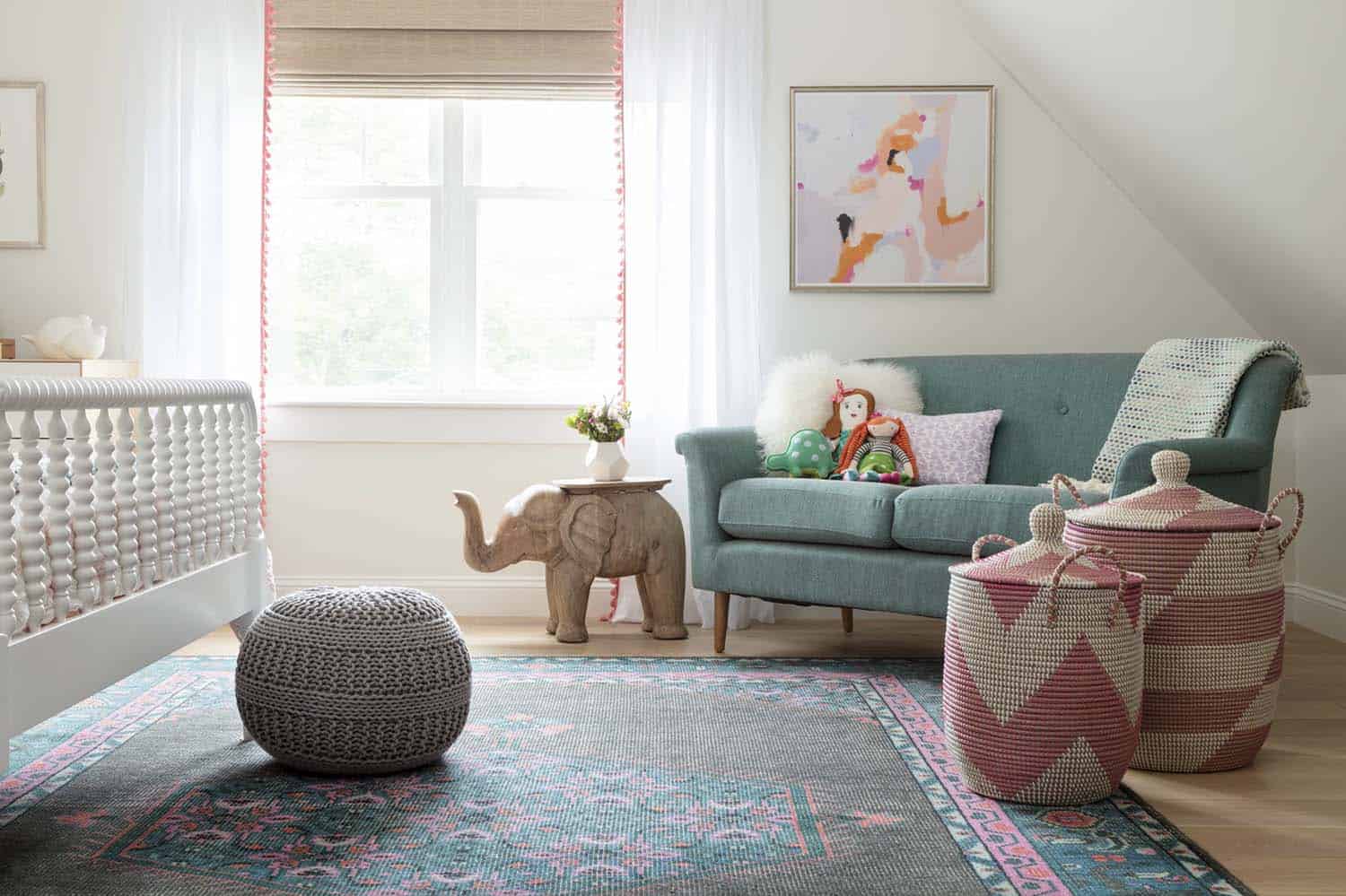 farmhouse kids bedroom with an area rug and blue corner sofa
