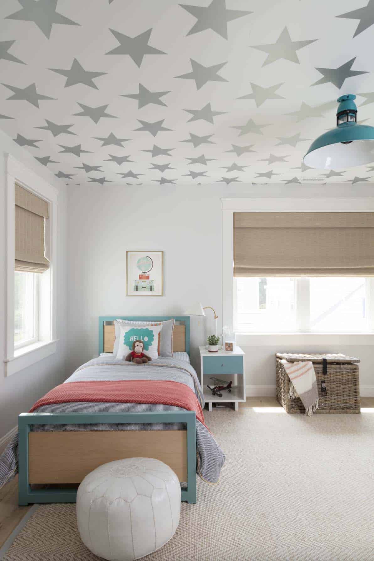 farmhouse kids bedroom with star wallpaper on the ceiling