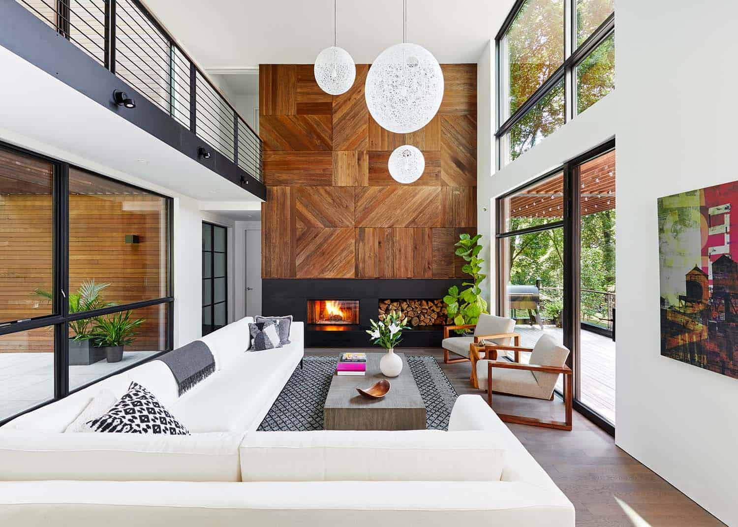 modern-living-room-with-a-wood-and-steel-fireplace