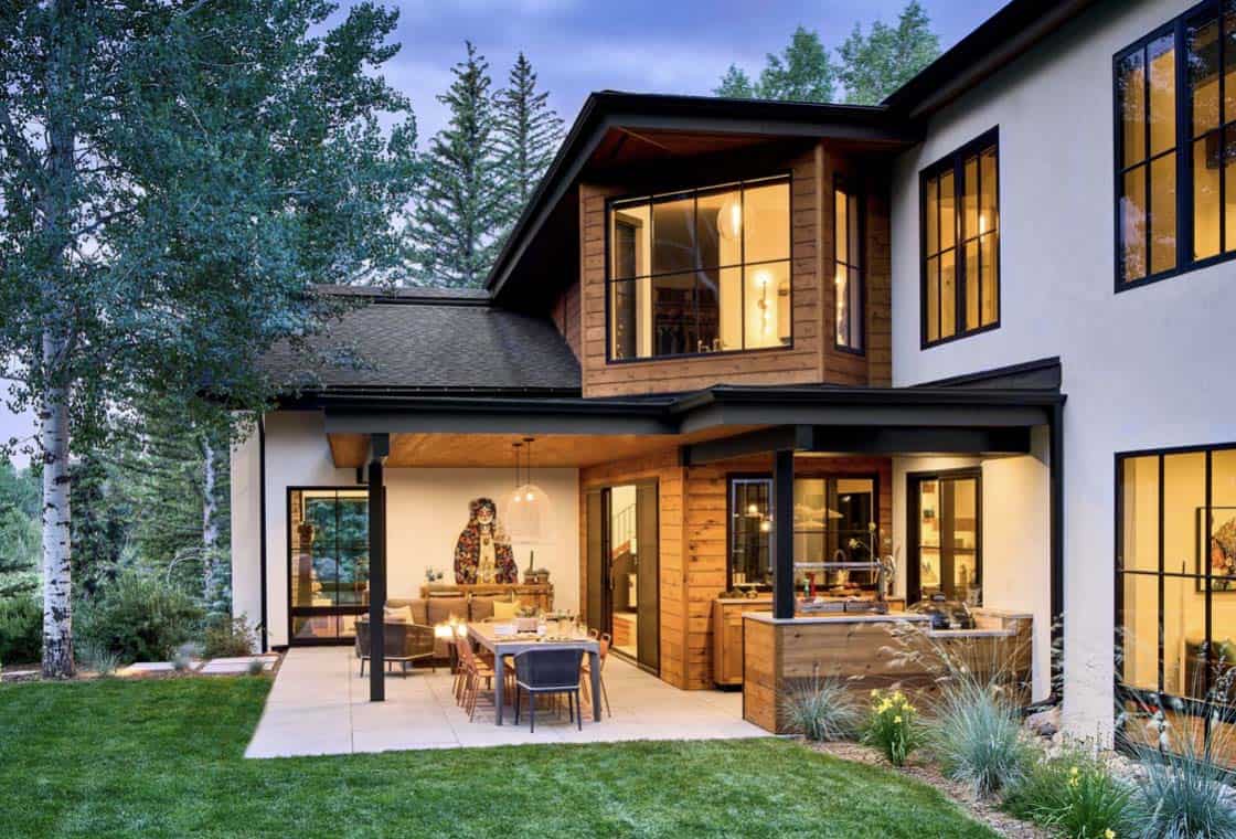 modern mountain home backyard with a patio