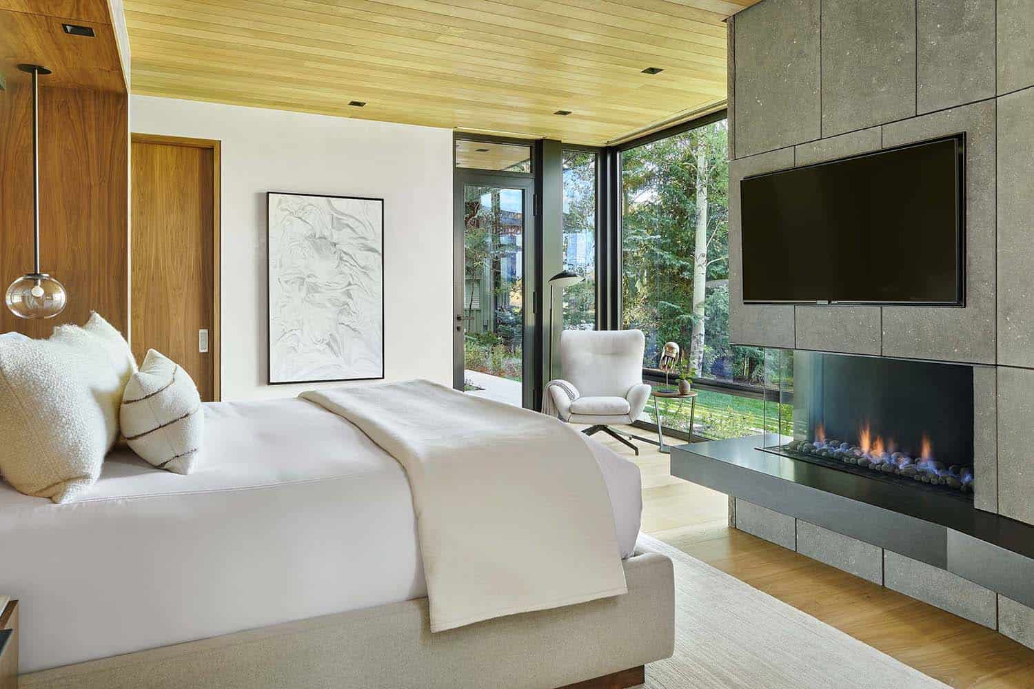 modern-bedroom-with-a-fireplace