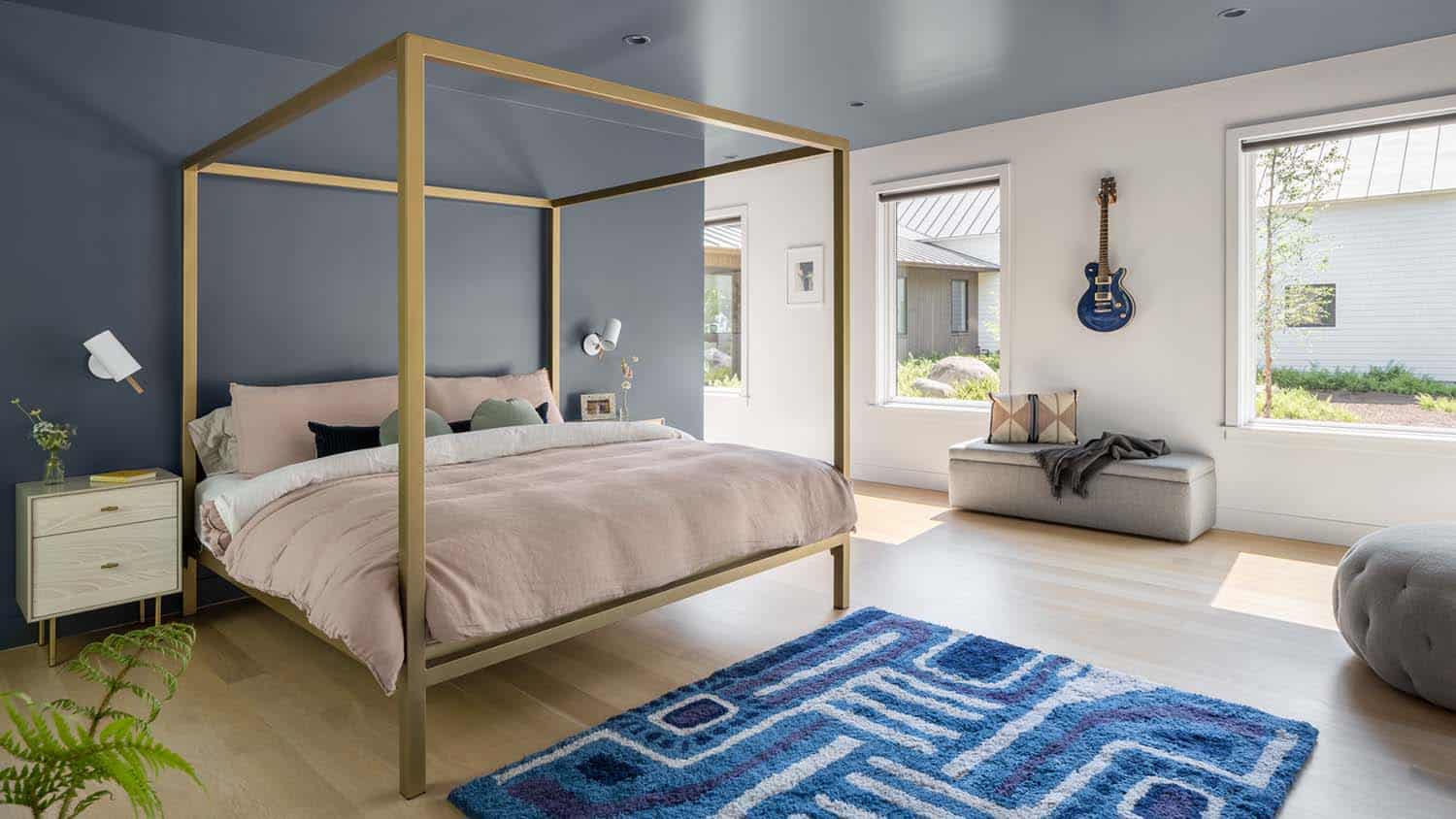modern bedroom with a canopy bed