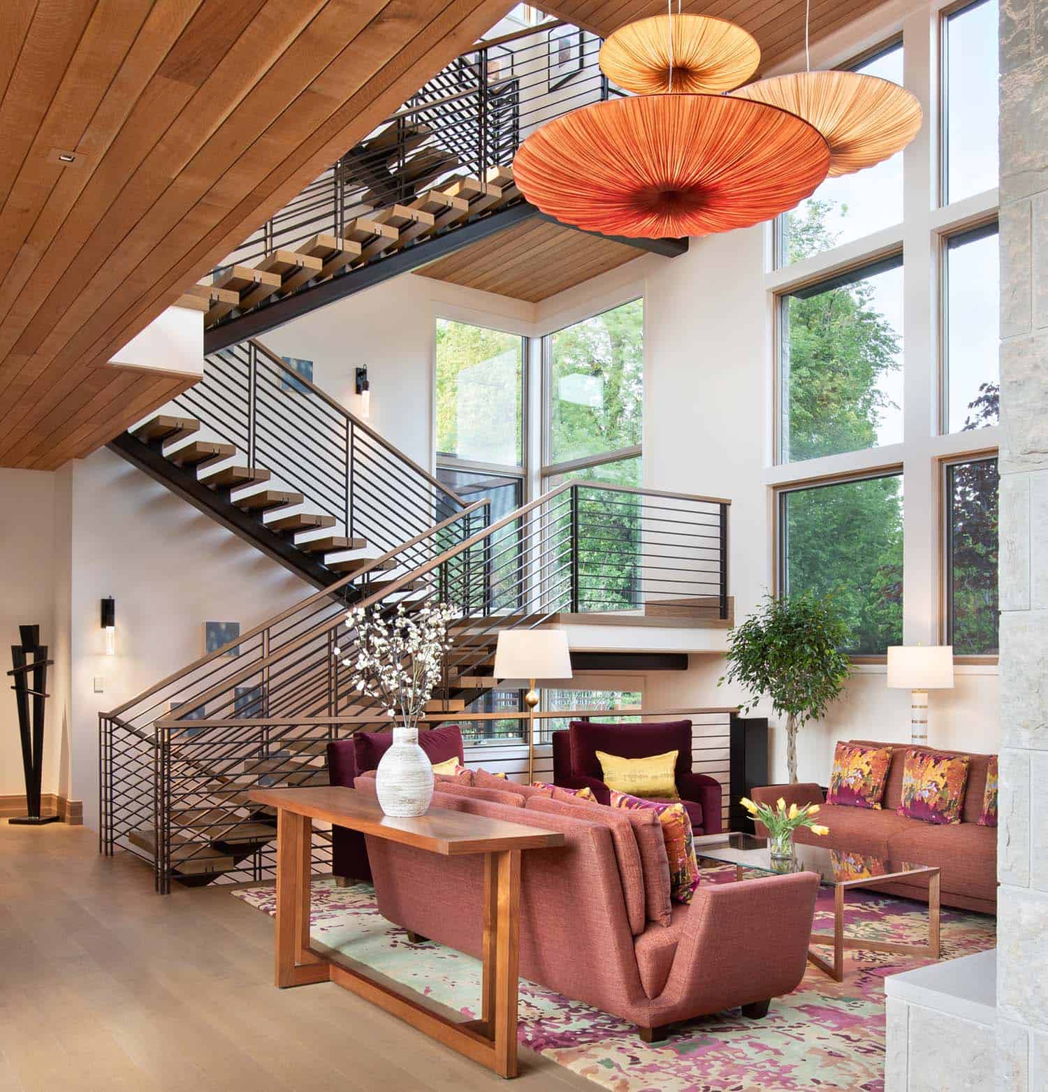 modern living room with a floating staircase