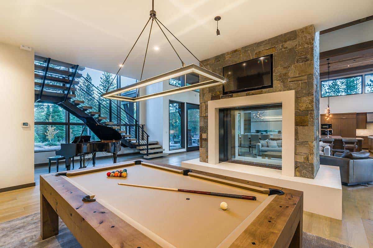 mountain contemporary pool table with a fireplace