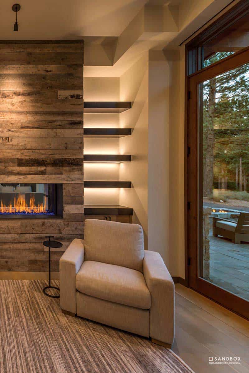 mountain contemporary bedroom reading nook with a fireplace