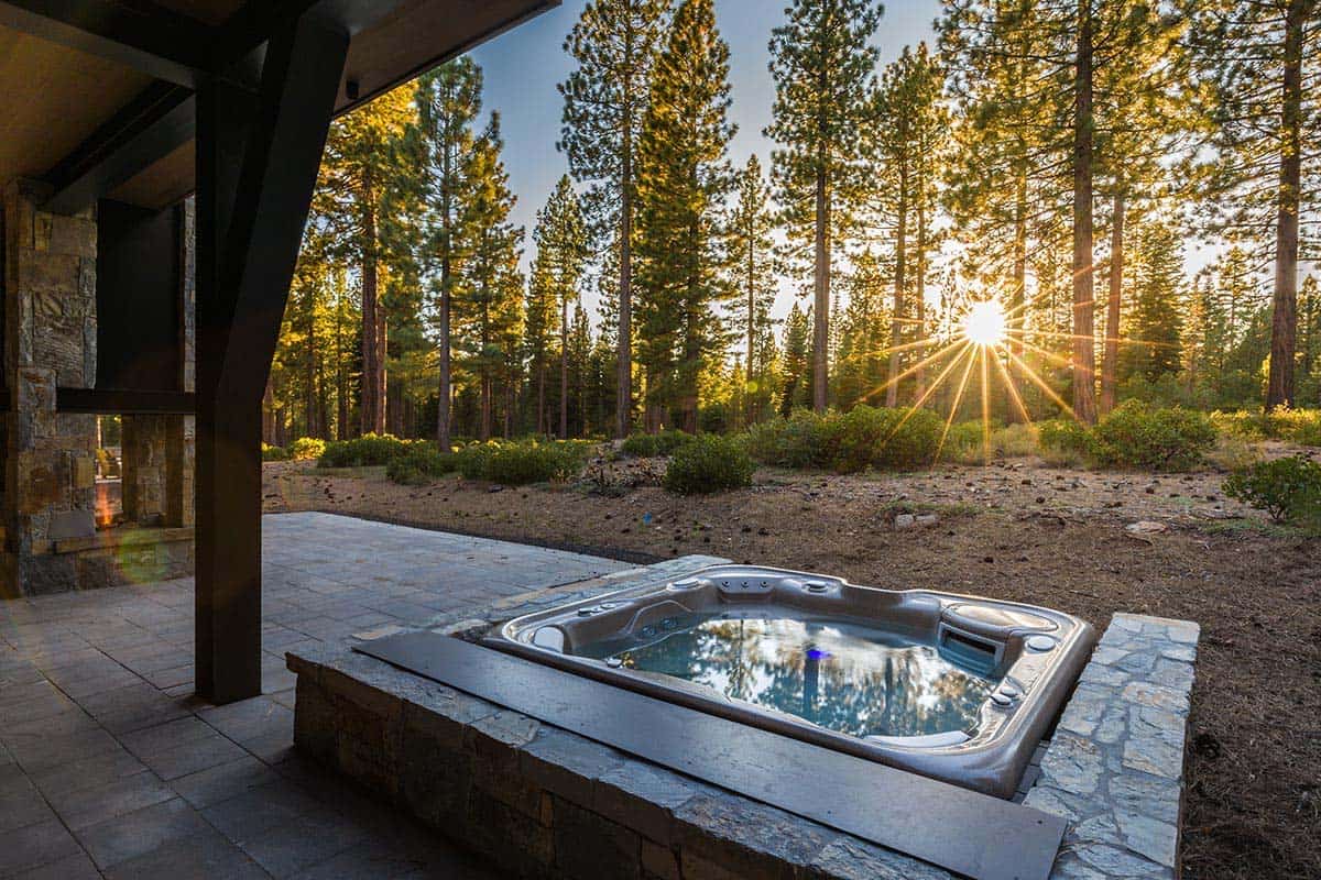 mountain contemporary patio with a hot tub