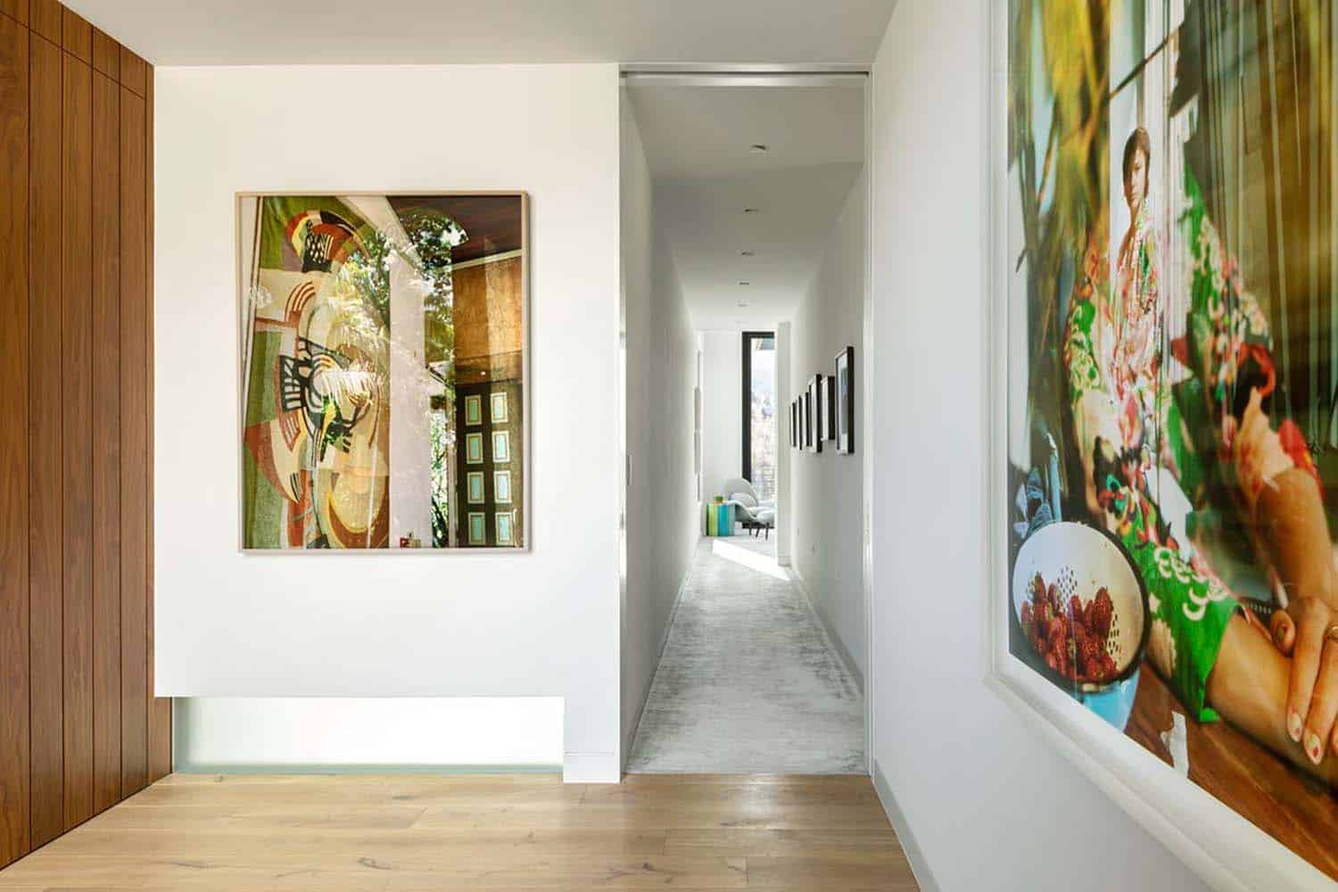 modern hallway with artwork on the walls