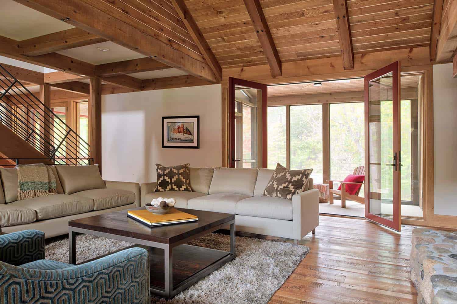 rustic farmhouse style living room with wood beams on the ceiling