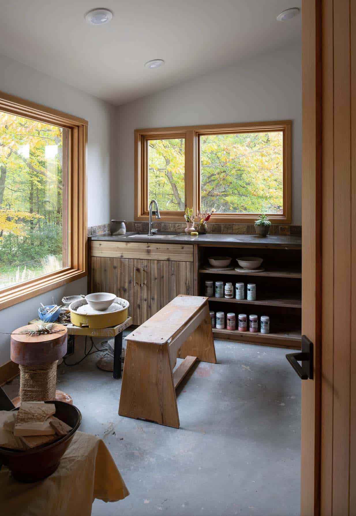 rustic pottery studio with a large window