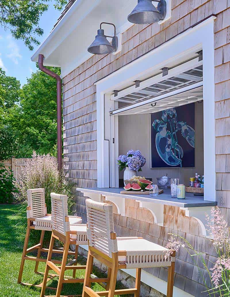 shingle style pool house bar with a pass through window