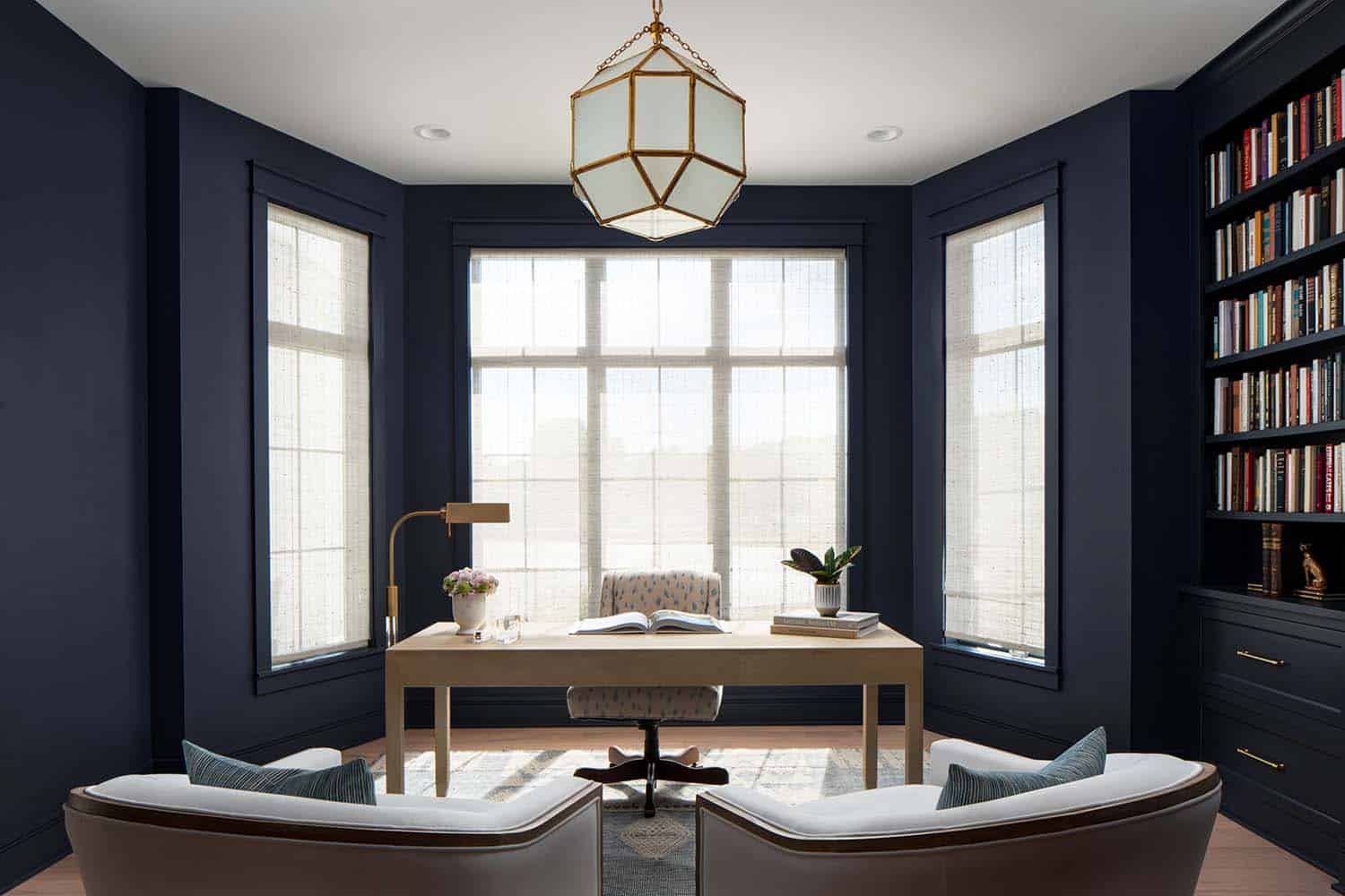 home office with navy blue walls