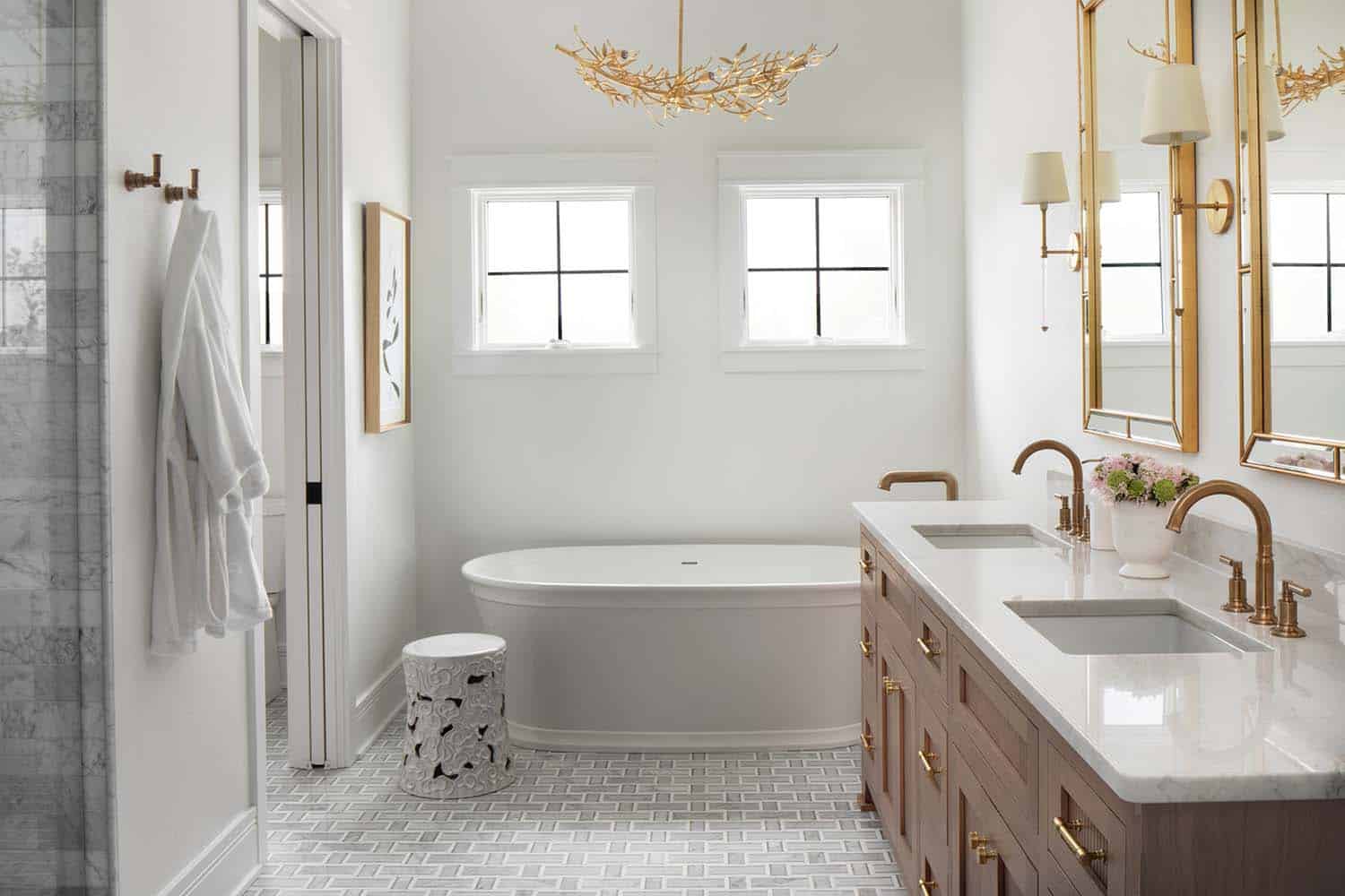 transitional style bathroom with a freestanding tub 