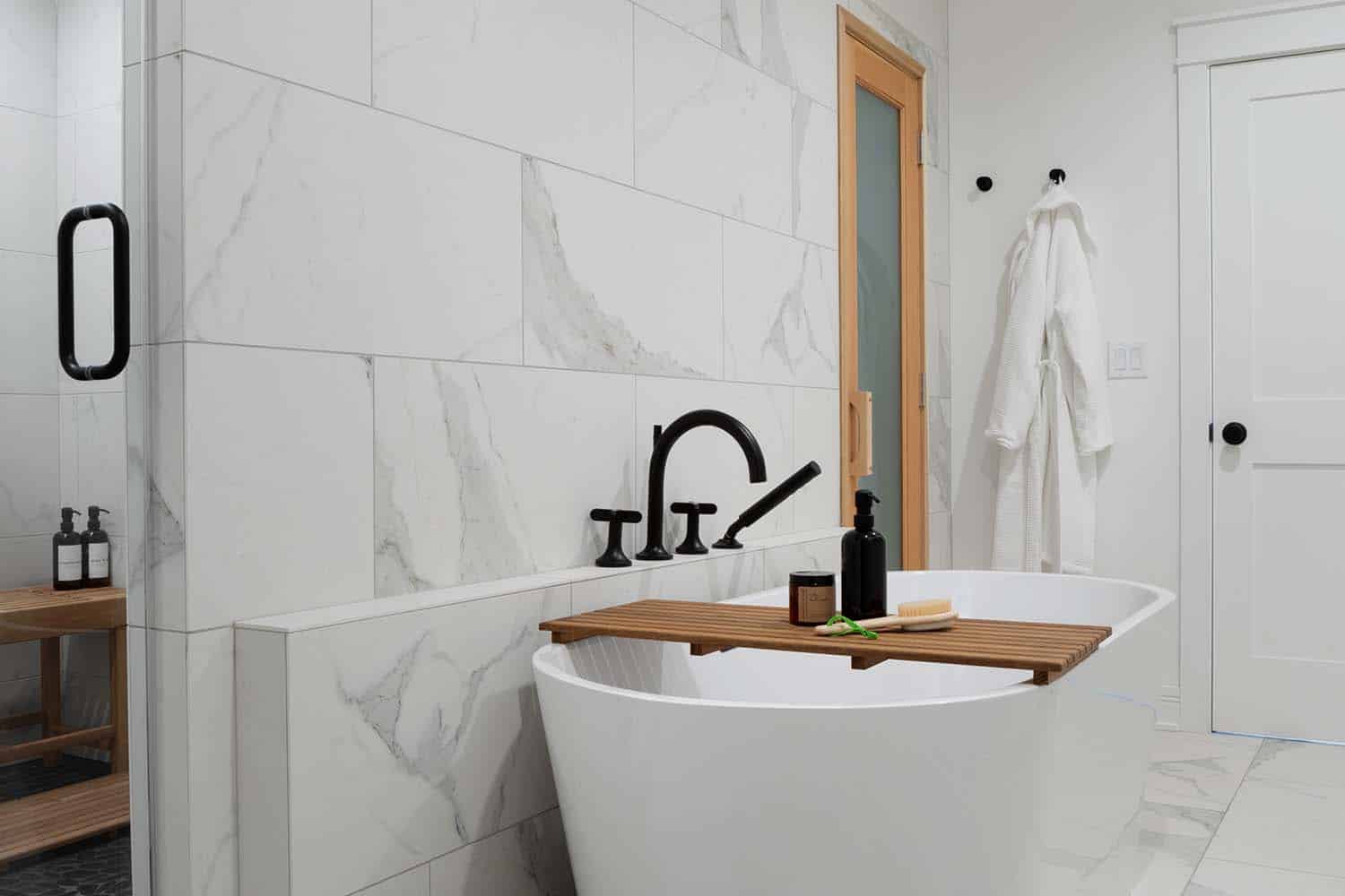 transitional style guest bathroom with a freestanding tub