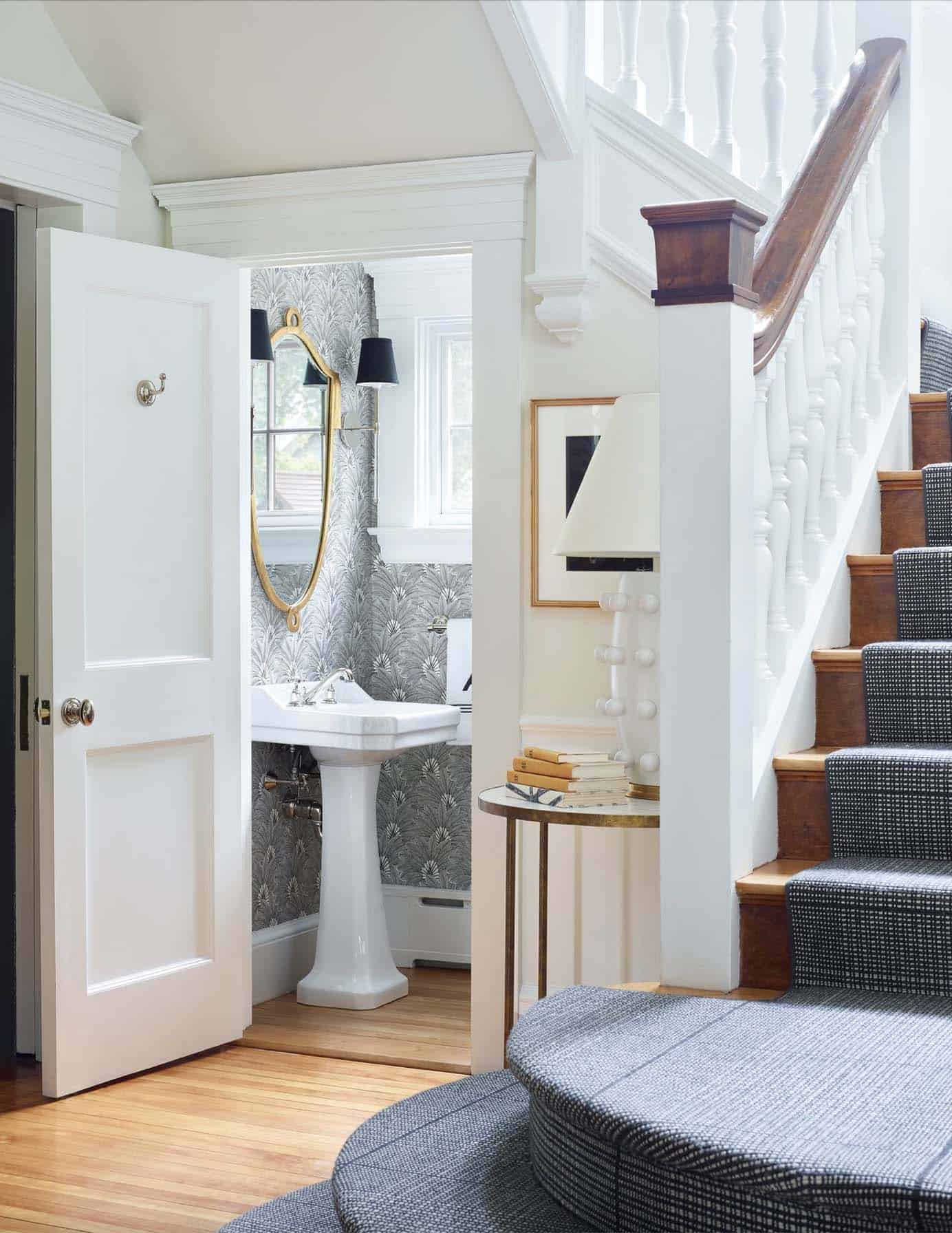 historic-house-traditional-entry-with-a-powder-room-underneath-the-stairs