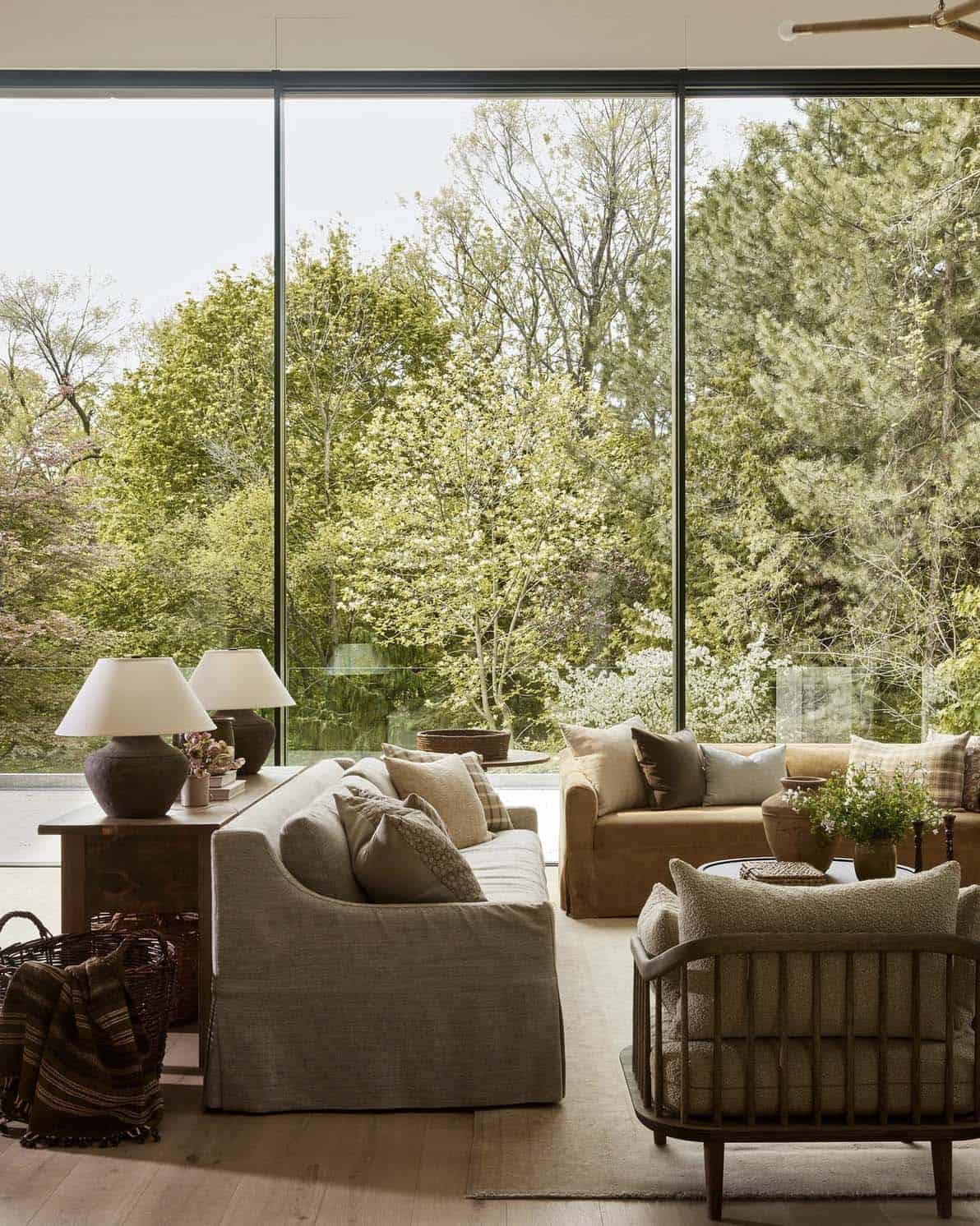 transitional style living room with a large window wall