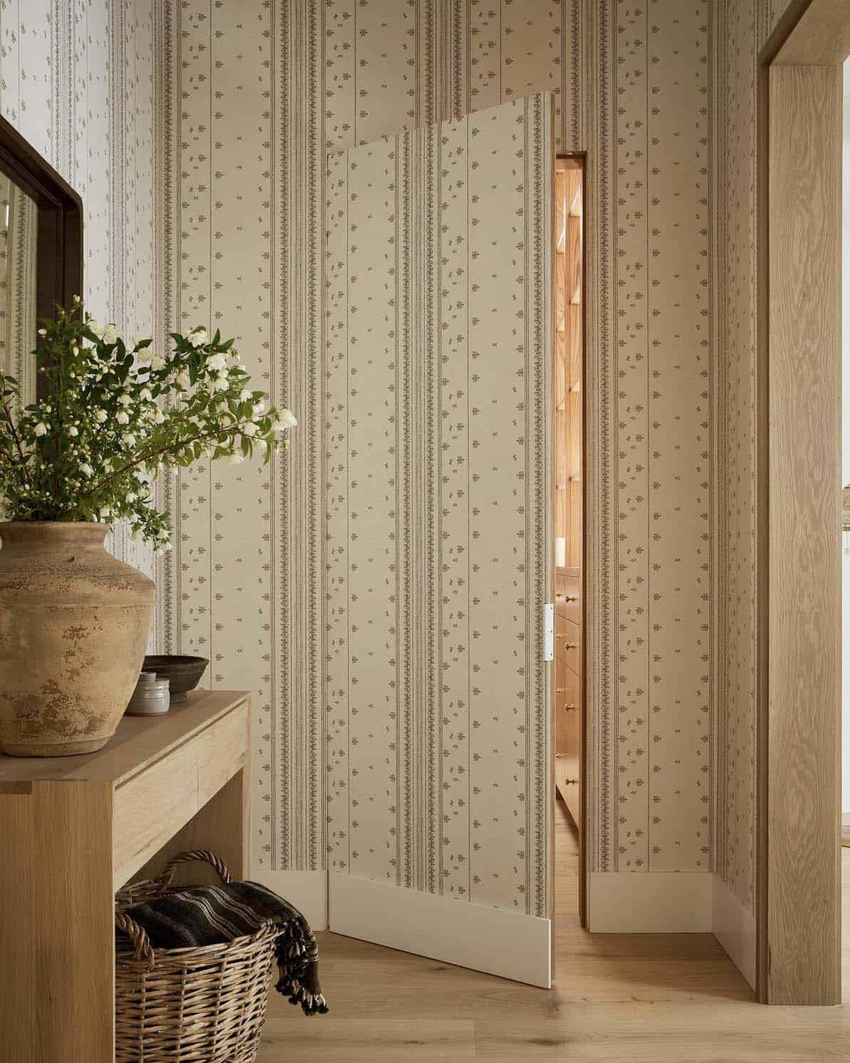 transitional style closet entry with a seamless door
